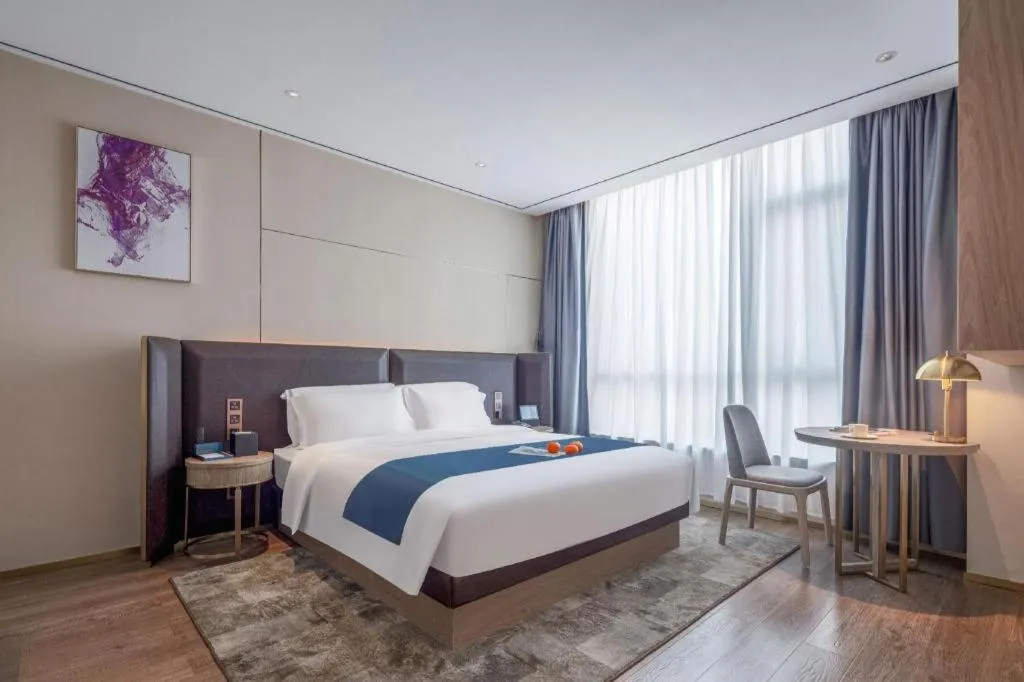 Bed in Echarm Hotel Zhuzhou Liling