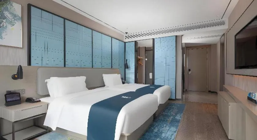 Bed in Echarm Hotel Zhuzhou Liling