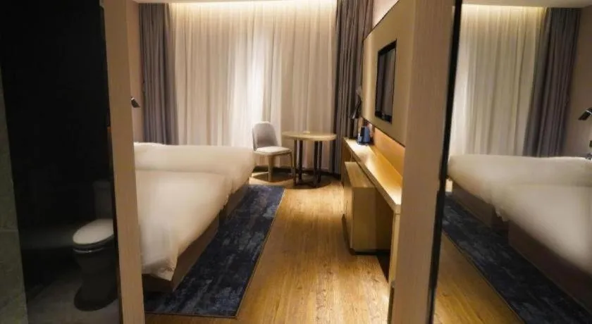 Bed in Echarm Hotel Zhuzhou Liling