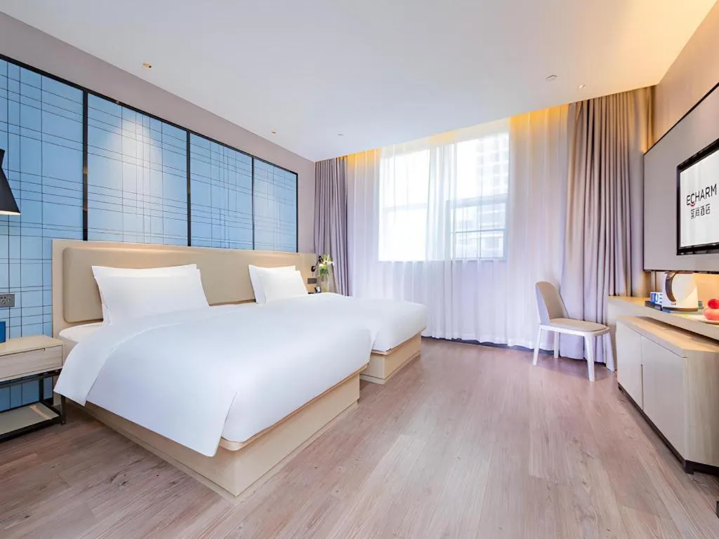 Bed in Echarm Hotel Wuhan Hankou Railway Station Zhuyeshan Metro Station