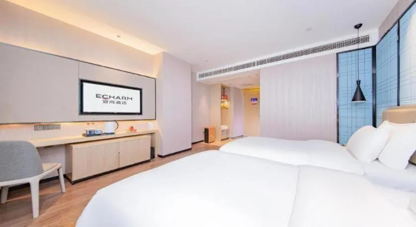 Bed in Echarm Hotel Wuhan Hankou Railway Station Zhuyeshan Metro Station