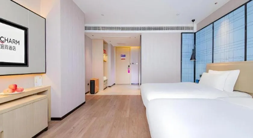 Bed in Echarm Hotel Wuhan Hankou Railway Station Zhuyeshan Metro Station