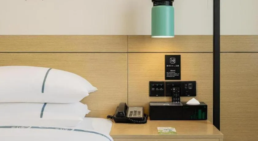 Bed in City Comfort Inn Jiujiang Gongqing Science and Technology College High-speed Railway Station