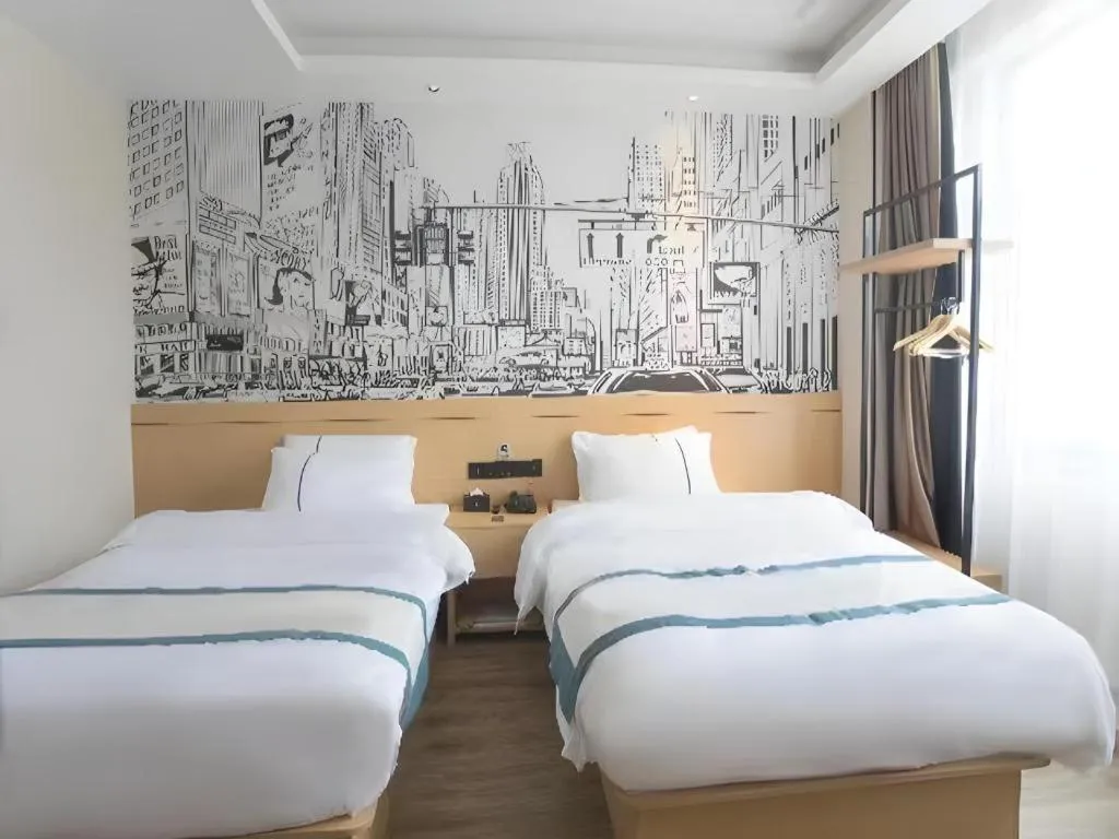 Bed in City Comfort Inn Jiujiang Gongqing Science and Technology College High-speed Railway Station