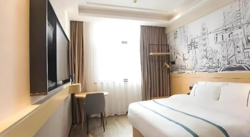 Bed in City Comfort Inn Jiujiang Gongqing Science and Technology College High-speed Railway Station