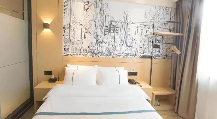 Bed in City Comfort Inn Jiujiang Gongqing Science and Technology College High-speed Railway Station