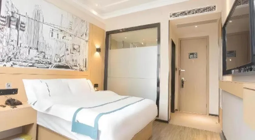 Bed in City Comfort Inn Jiujiang Gongqing Science and Technology College High-speed Railway Station