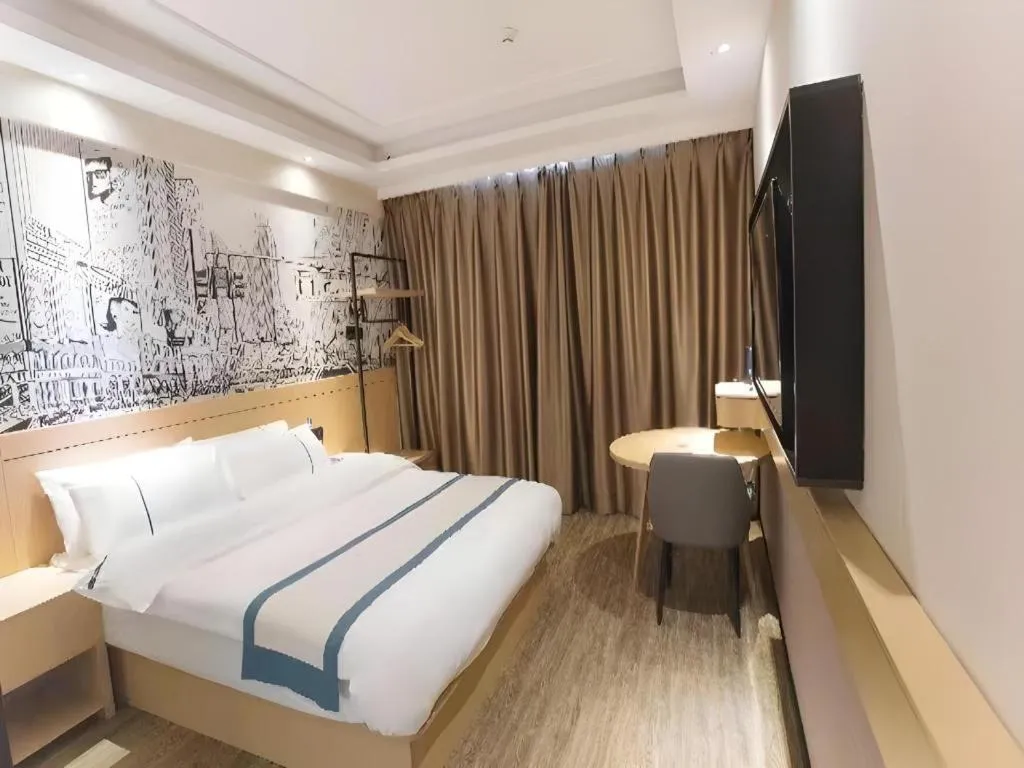 Bed in City Comfort Inn Jiujiang Gongqing Science and Technology College High-speed Railway Station