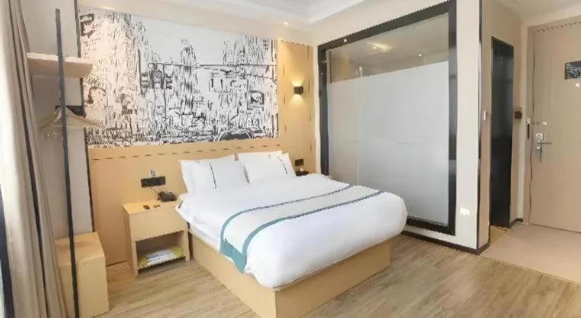 Bed in City Comfort Inn Jiujiang Gongqing Science and Technology College High-speed Railway Station