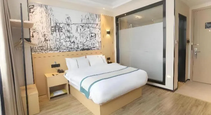 Bed in City Comfort Inn Jiujiang Gongqing Science and Technology College High-speed Railway Station