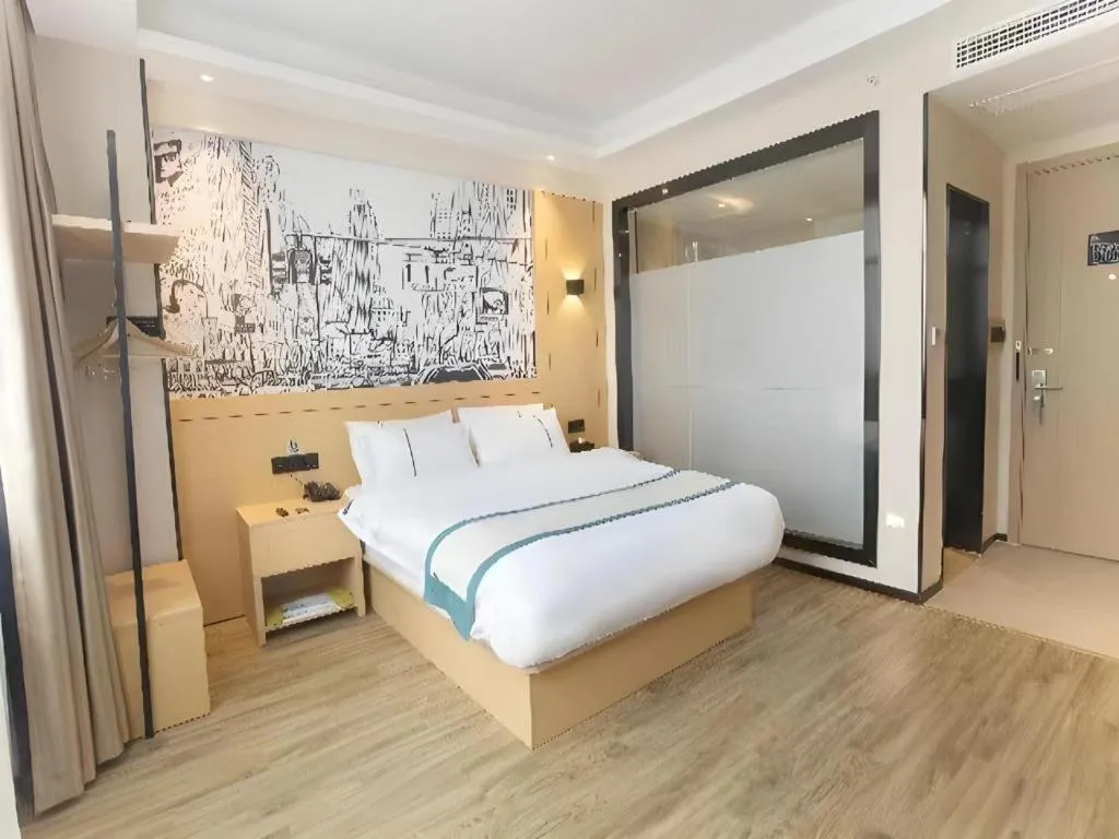 Bed in City Comfort Inn Jiujiang Gongqing Science and Technology College High-speed Railway Station