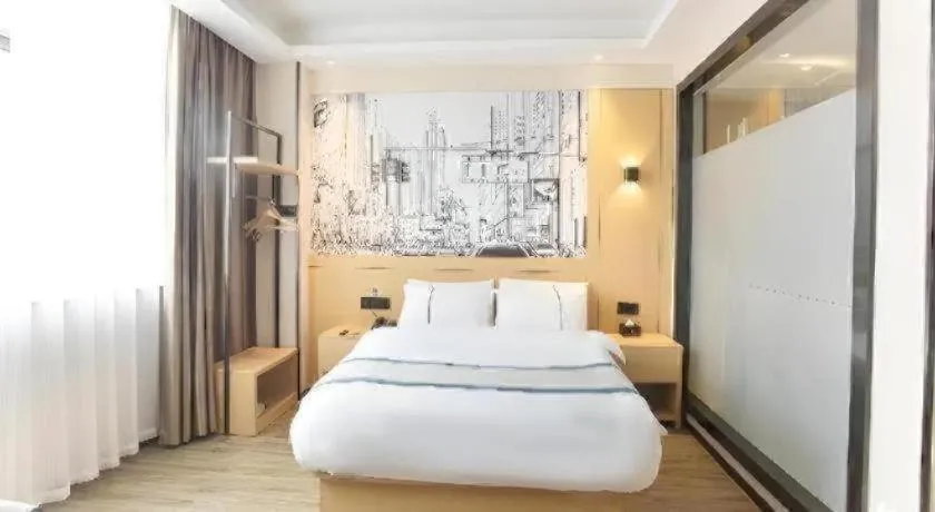 Bed in City Comfort Inn Jiujiang Gongqing Science and Technology College High-speed Railway Station