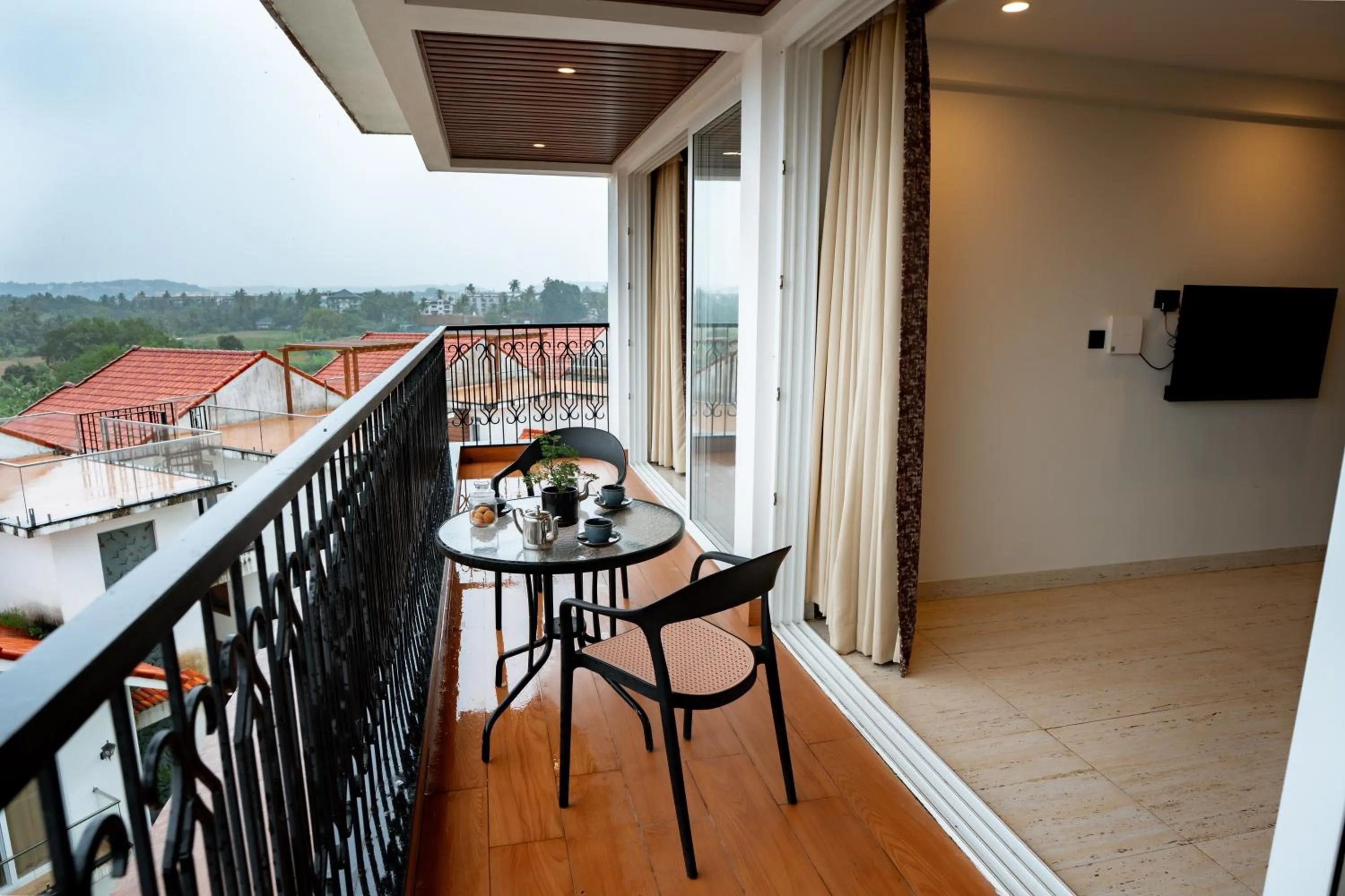 Balcony/Terrace in The Tanisi Resorts & Pool Villas, Candolim
