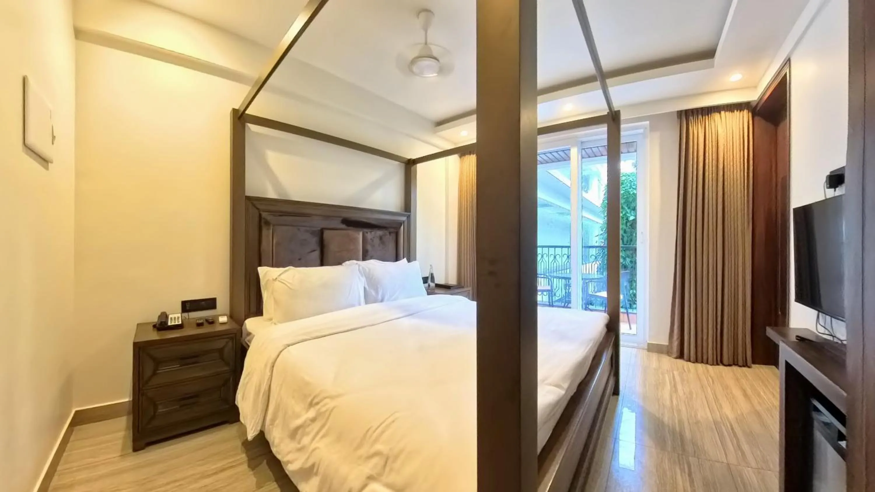 Bed in The Tanisi Resorts & Pool Villas, Candolim