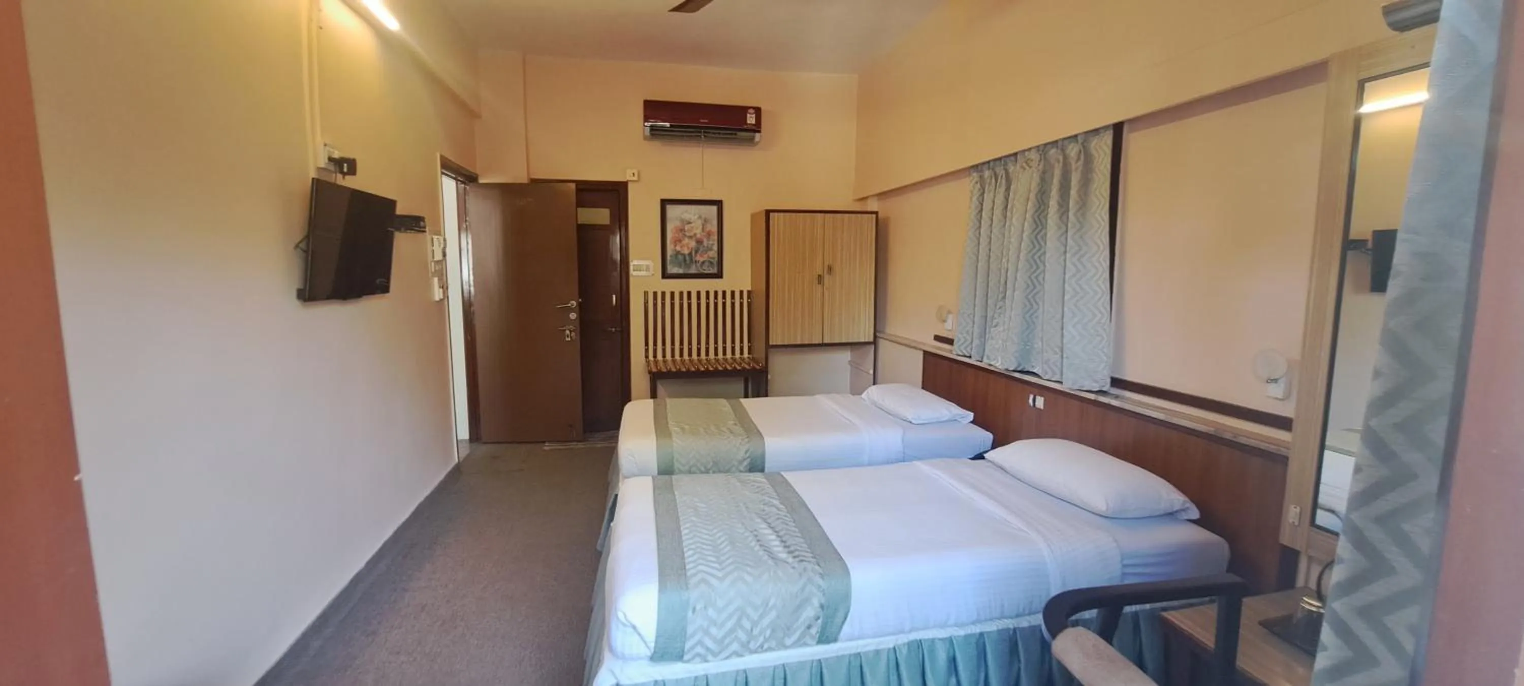 Photo of the whole room, Bed in Hotel Swaroop