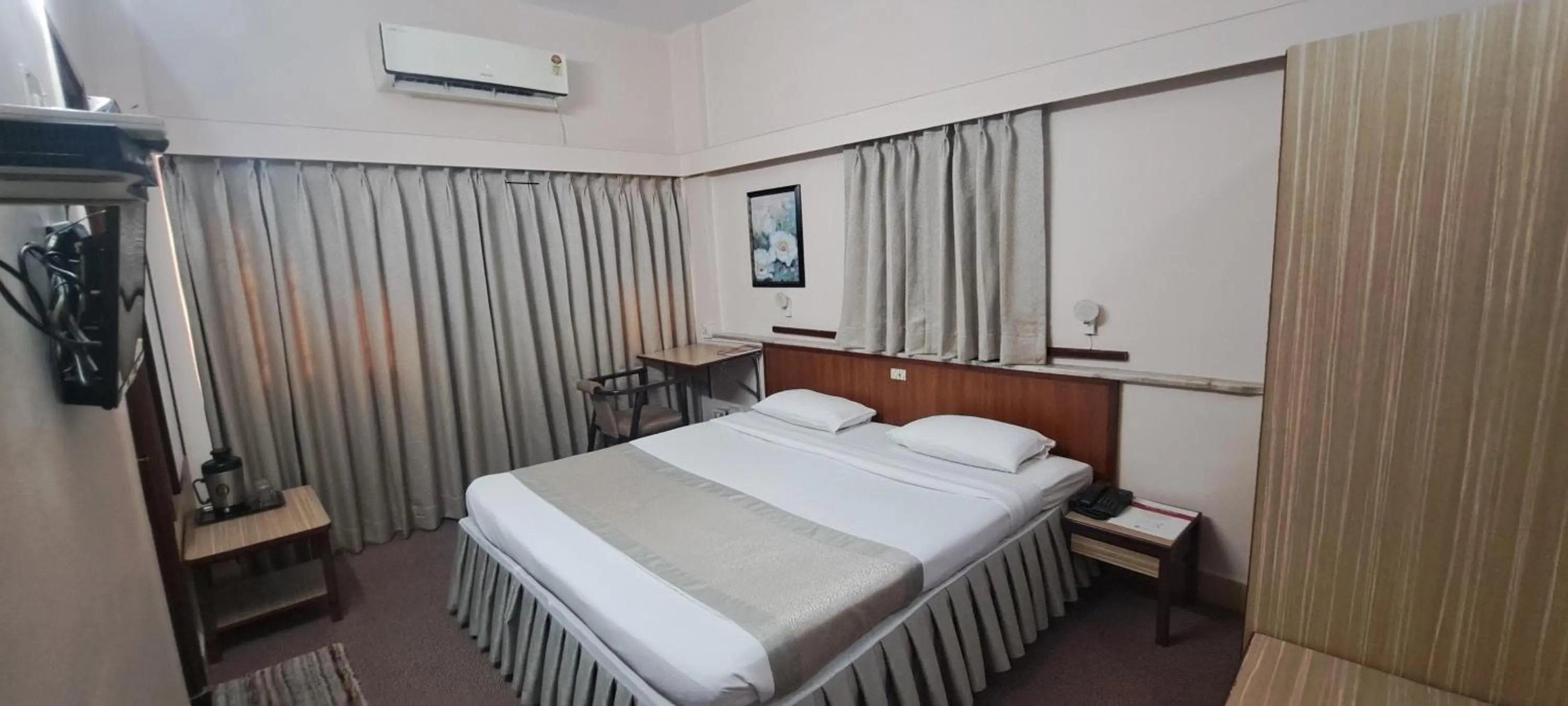 Bed in Hotel Swaroop