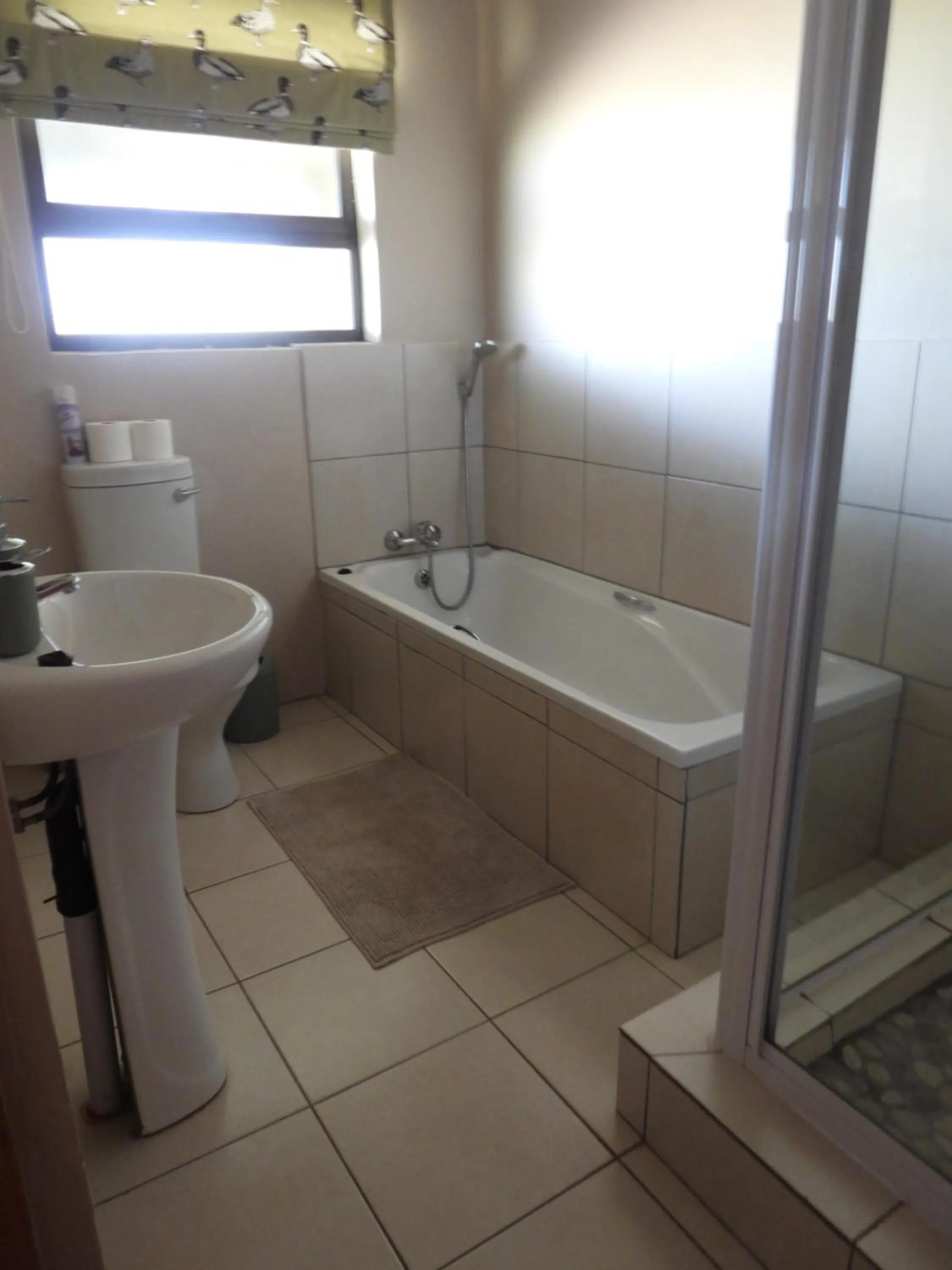 Bathroom in The Ranch House at African Safari Lodge