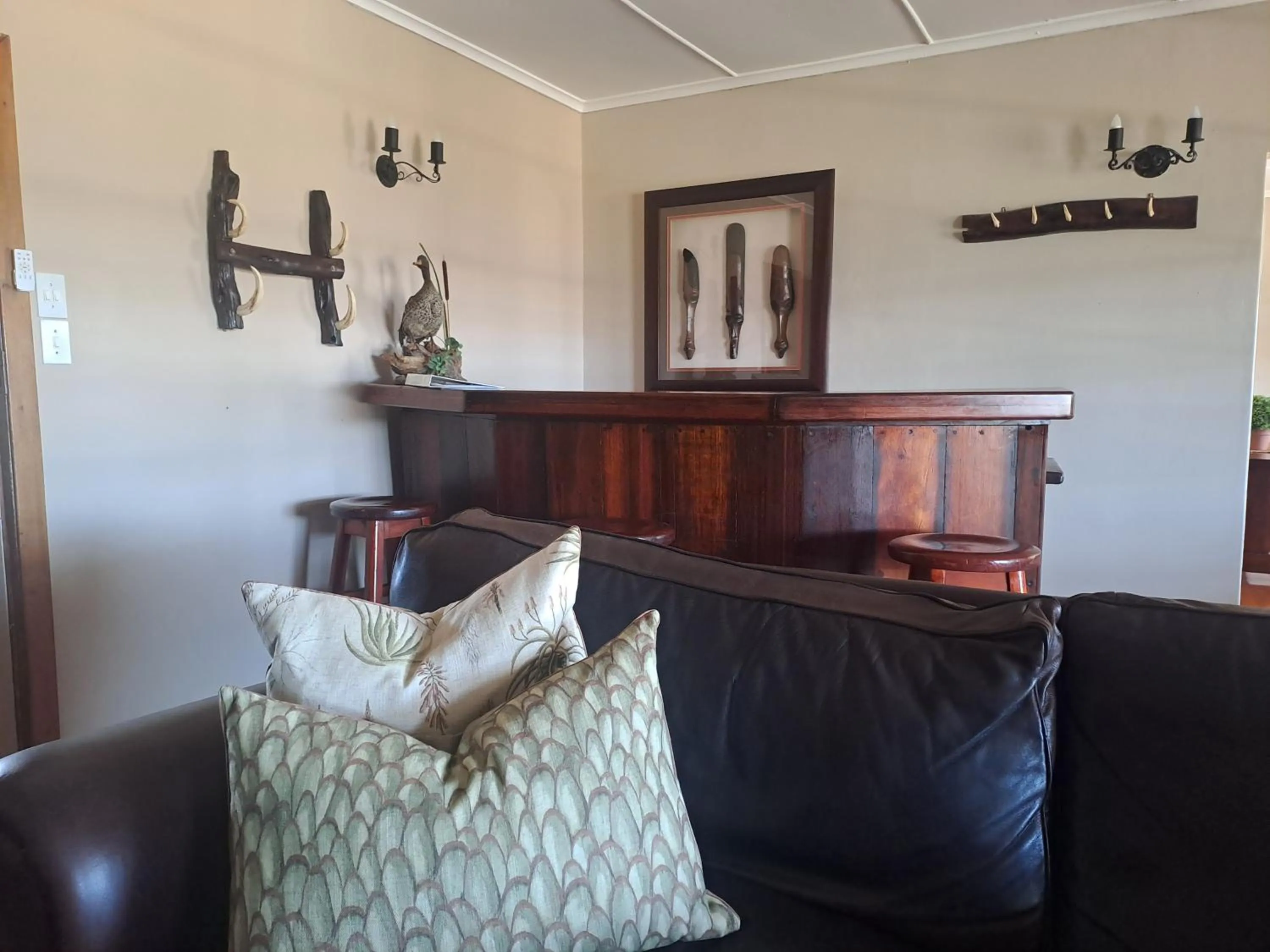 Lounge or bar in The Ranch House at African Safari Lodge