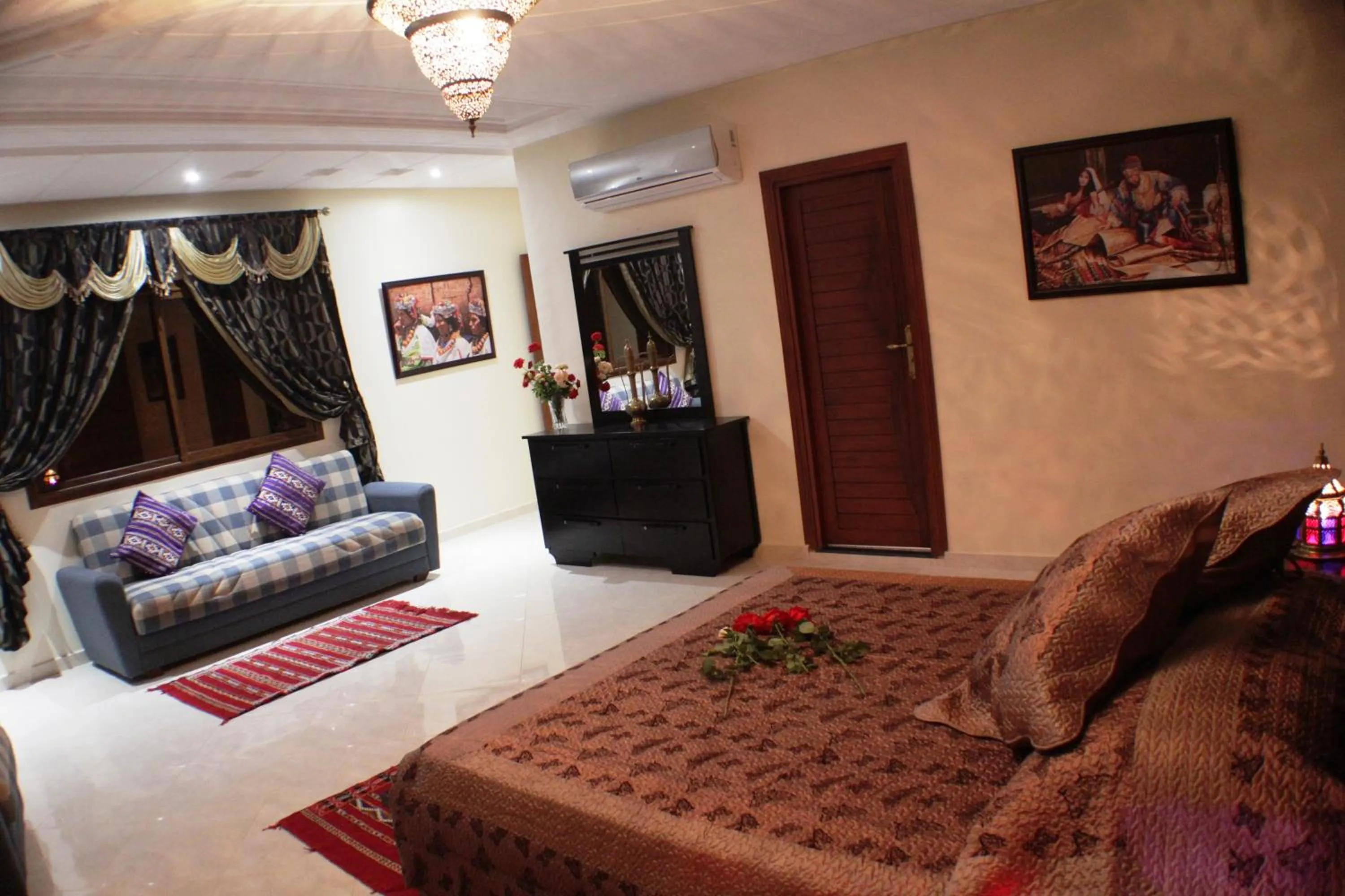 Living room, Bed in Riad Mimosa