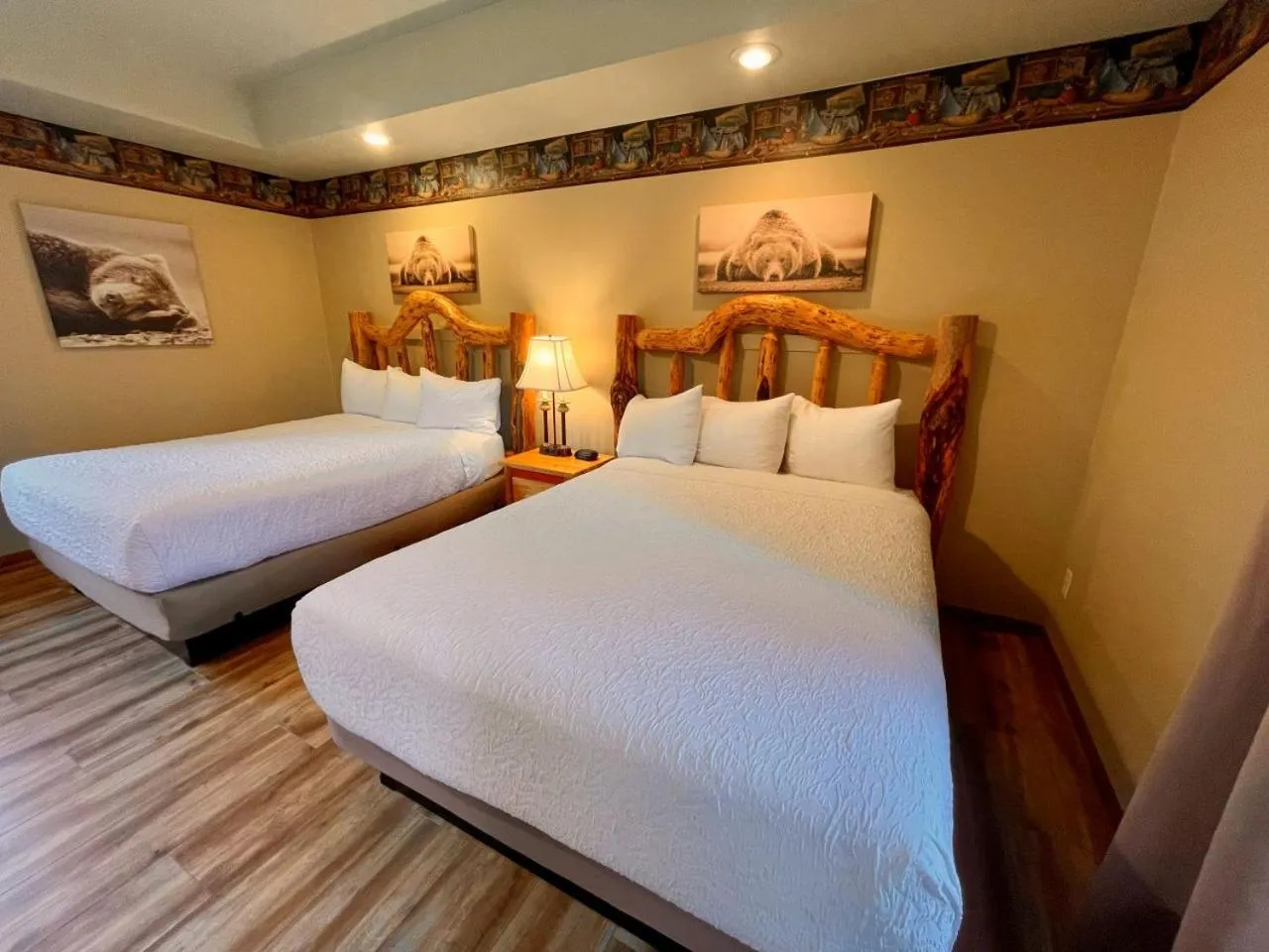 Bed in Riverfront Motel & Cabins