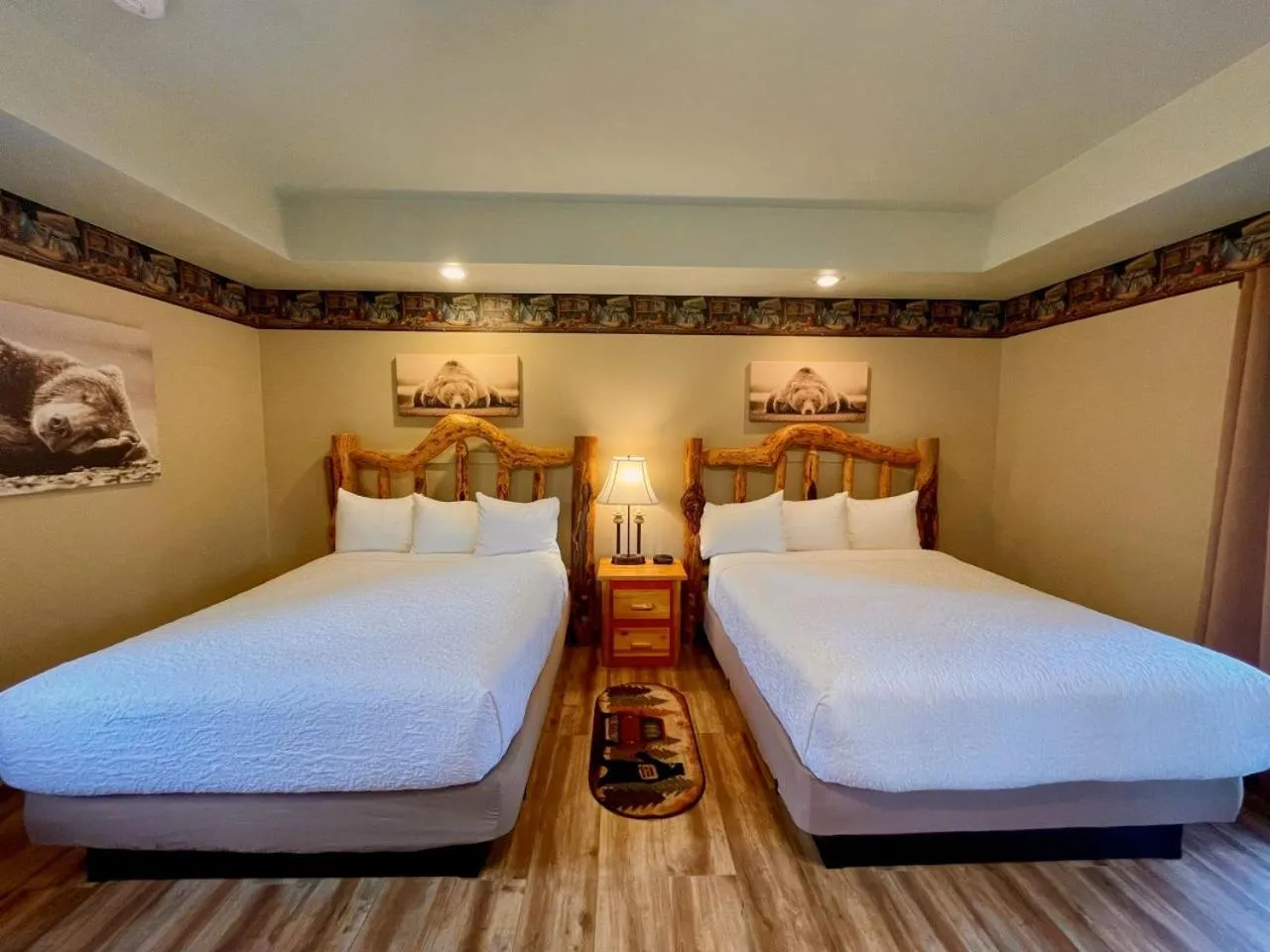 Bed in Riverfront Motel & Cabins