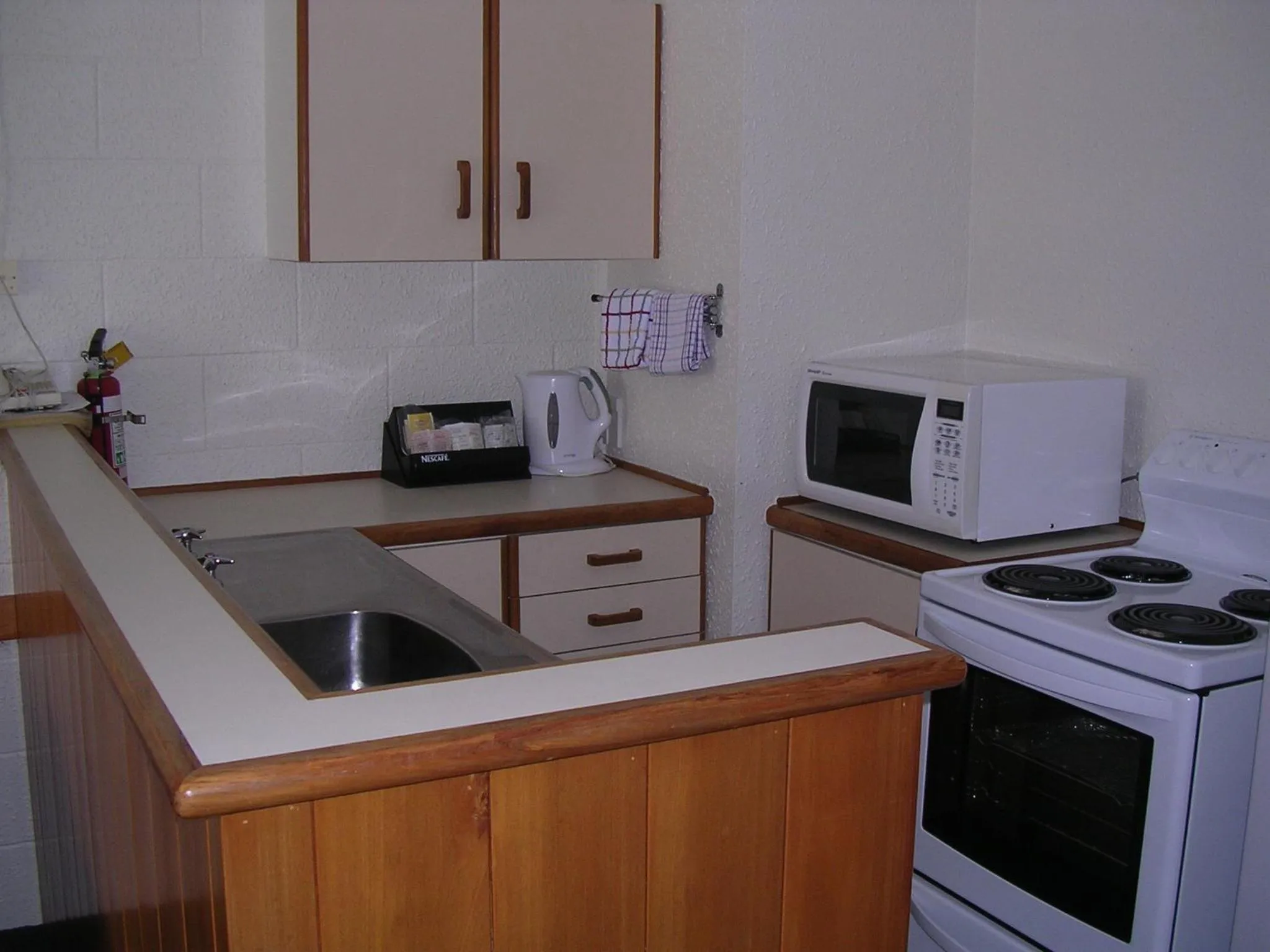 Kitchen or kitchenette in Acacia Lodge Motel
