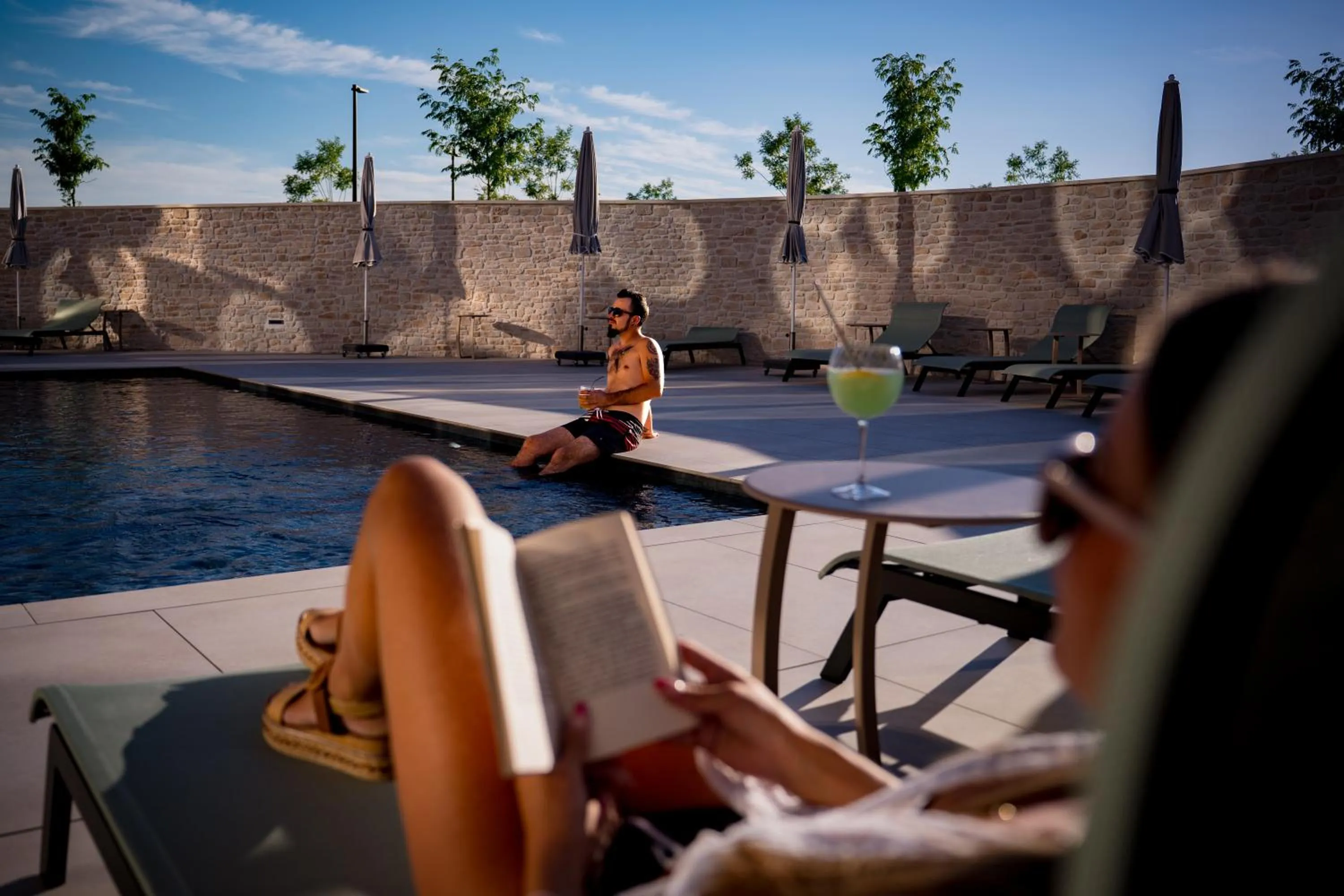 Swimming pool in Bô Hôtels Ambronay