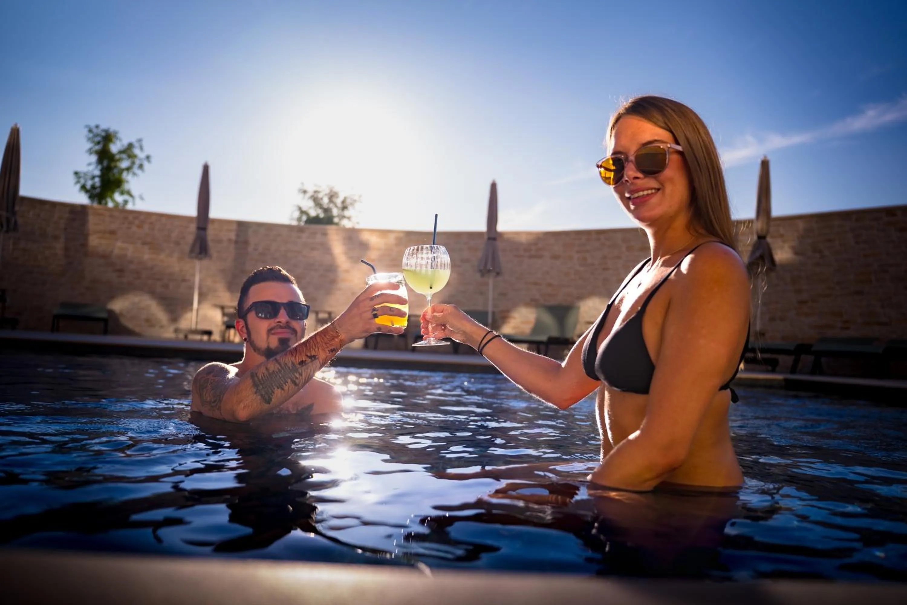 Swimming pool in Bô Hôtels Ambronay
