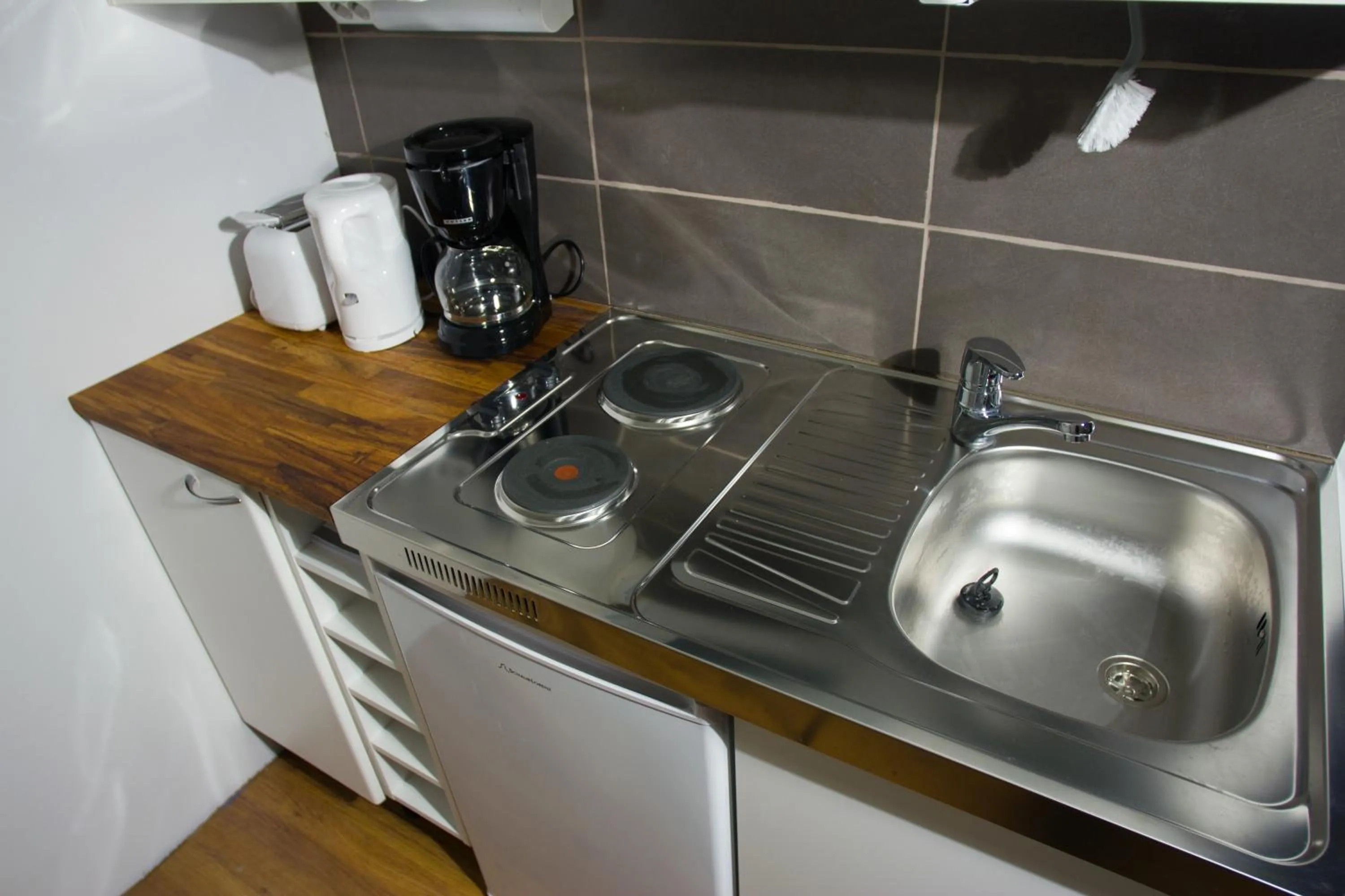 Kitchen or kitchenette in Salpalinjan Hovi