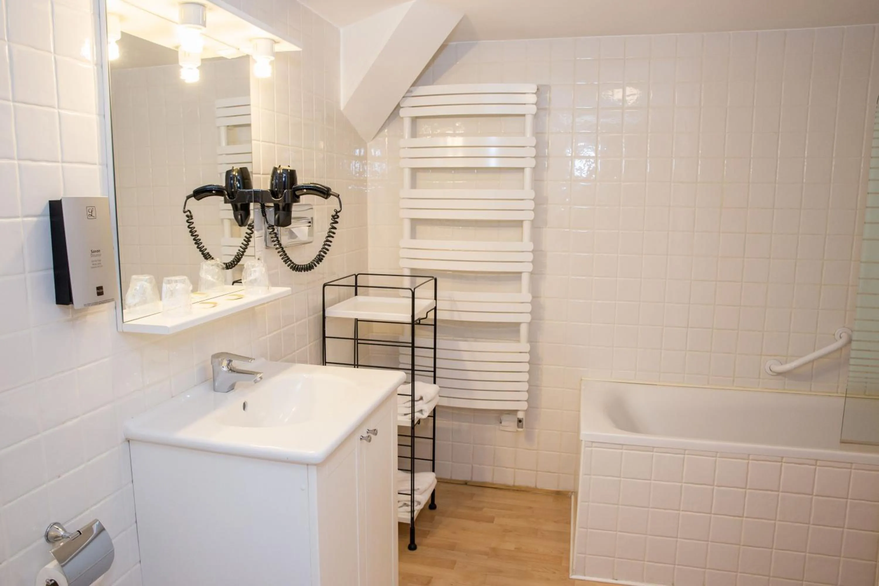 Bathroom in Appart Hotel Charles Sander