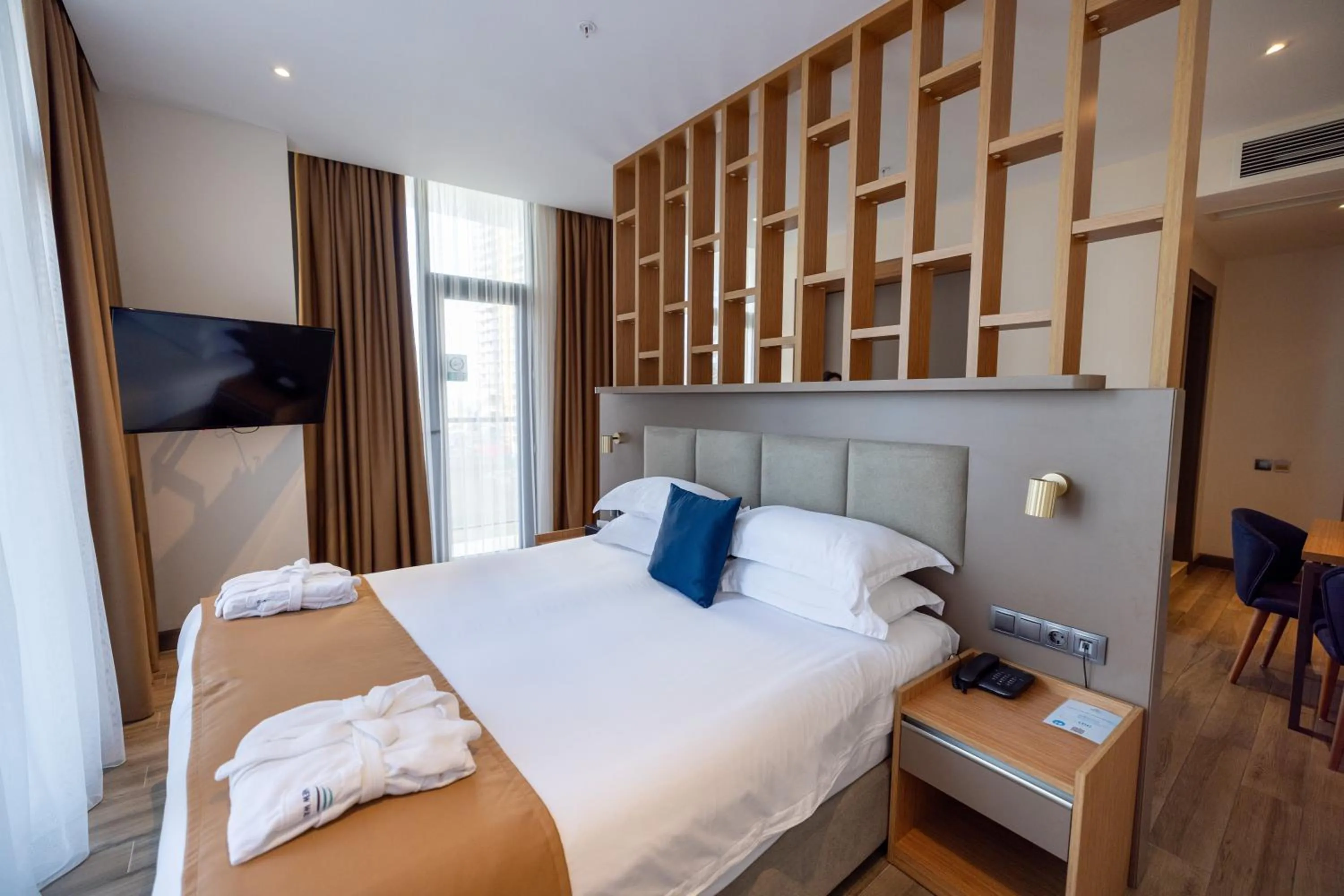 Photo of the whole room, Bed in New Wave Apart-Hotel