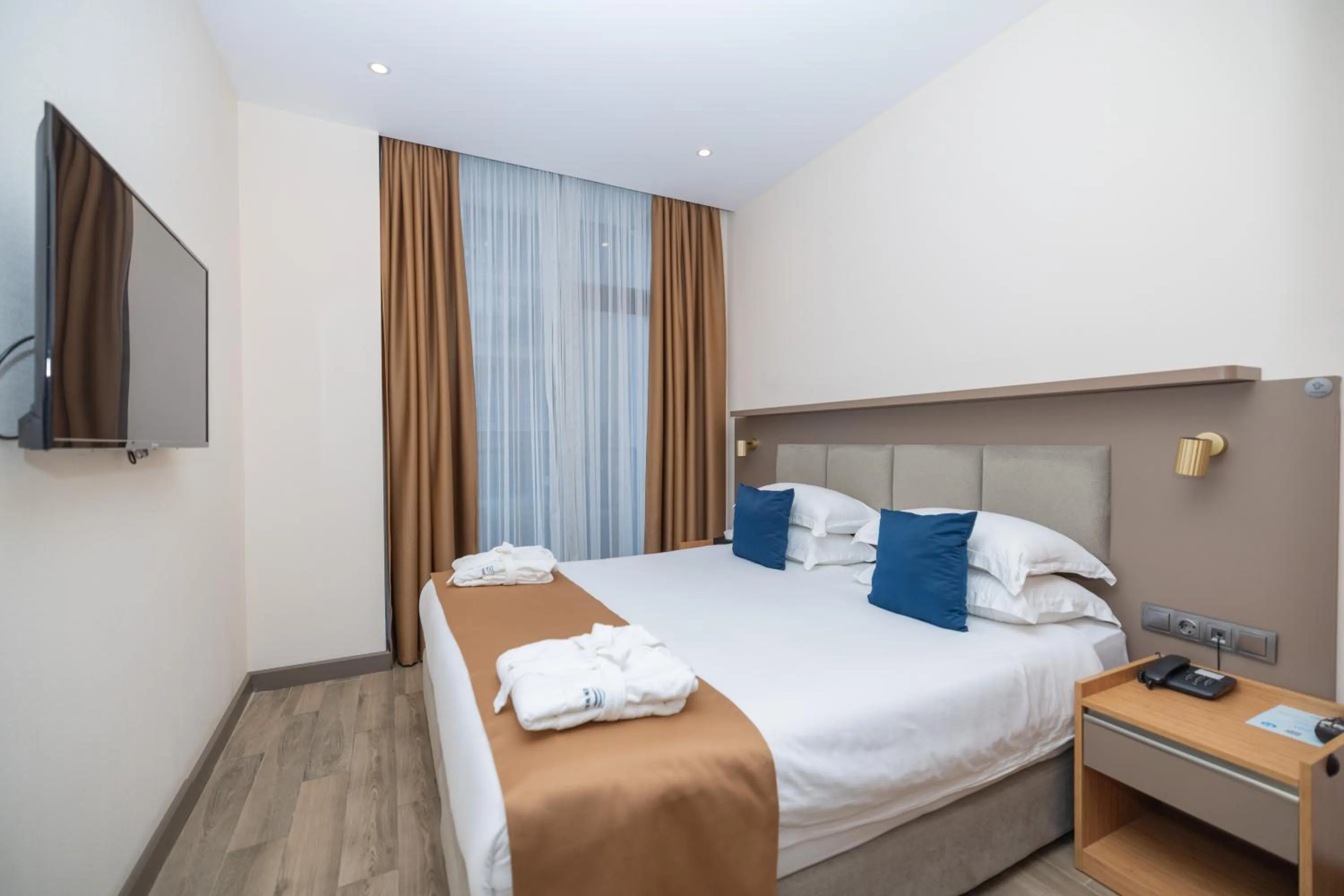 Property building, Bed in New Wave Apart-Hotel