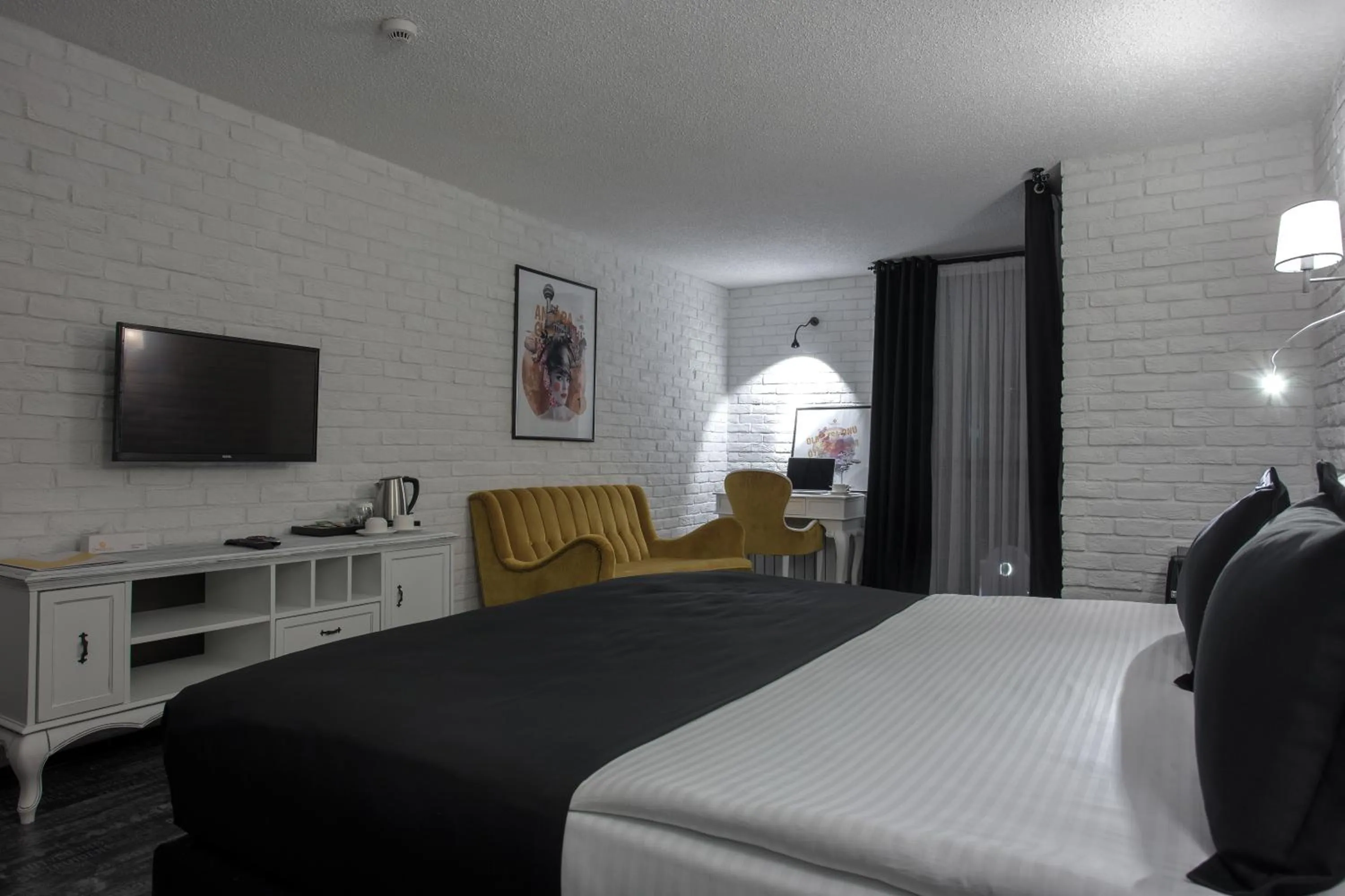 Bedroom in Check Inn Suite Hotel & SPA