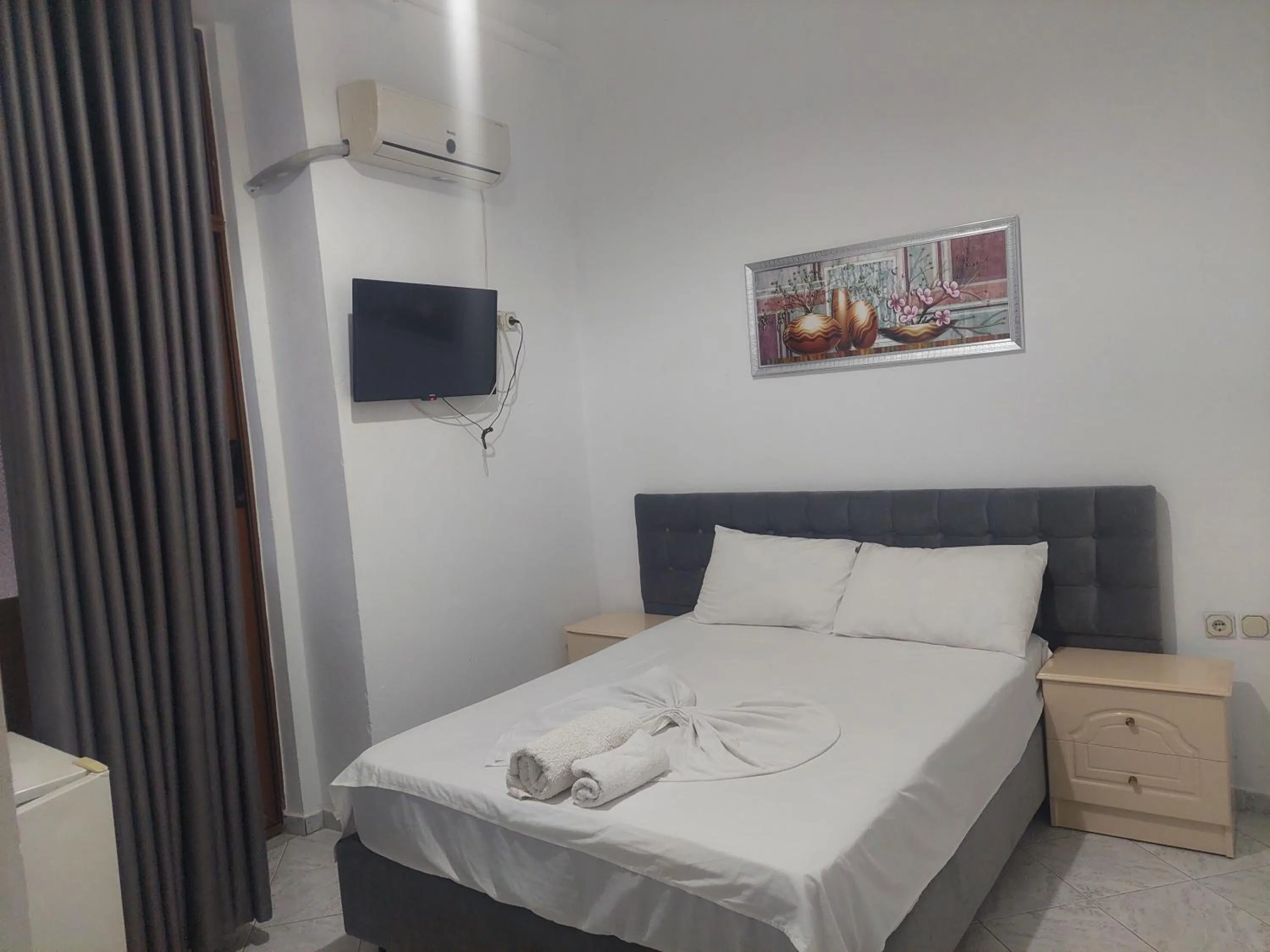 Bed in Casa Mia Economy Condos