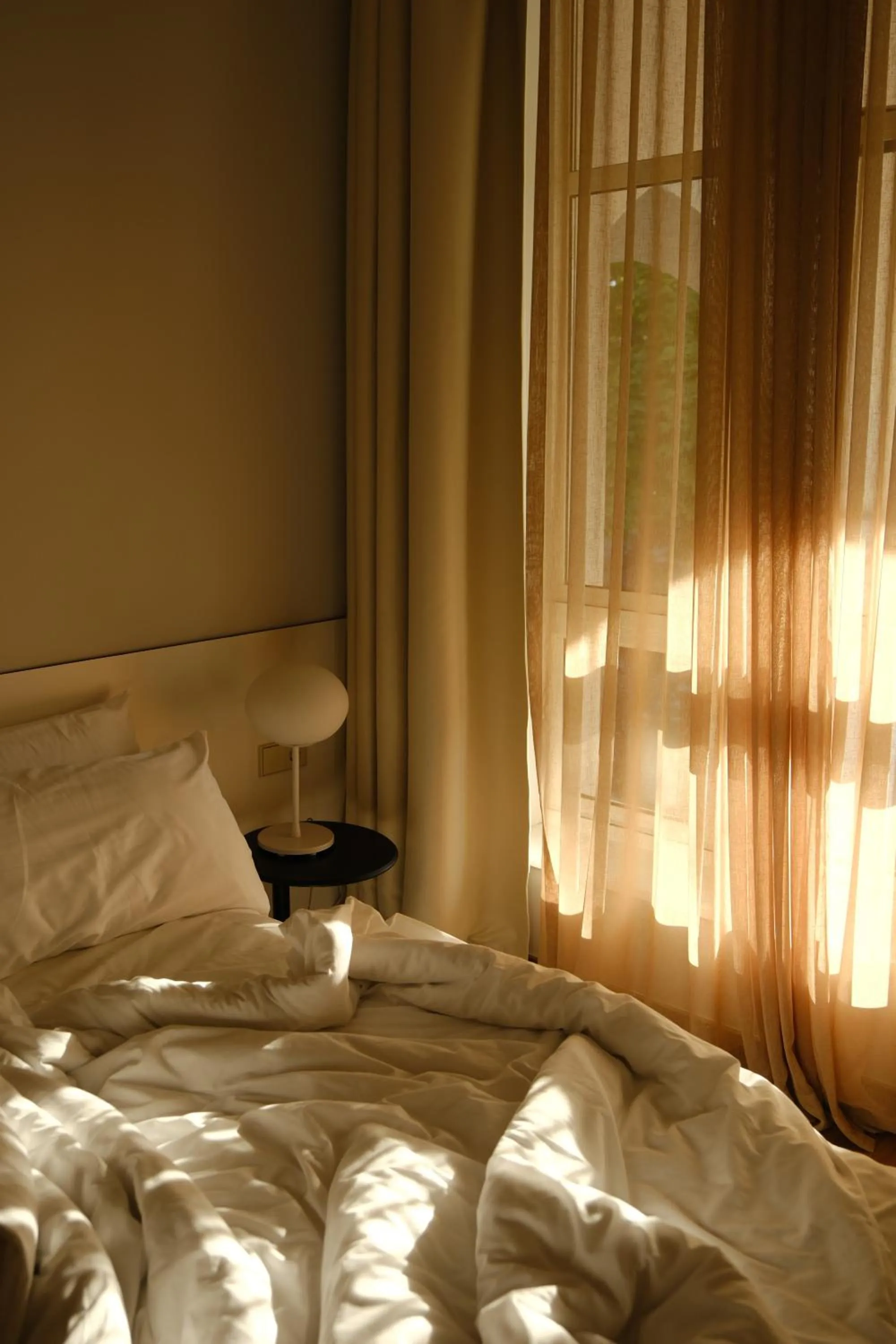 Bed in Le Port Boutique Apart Hotel