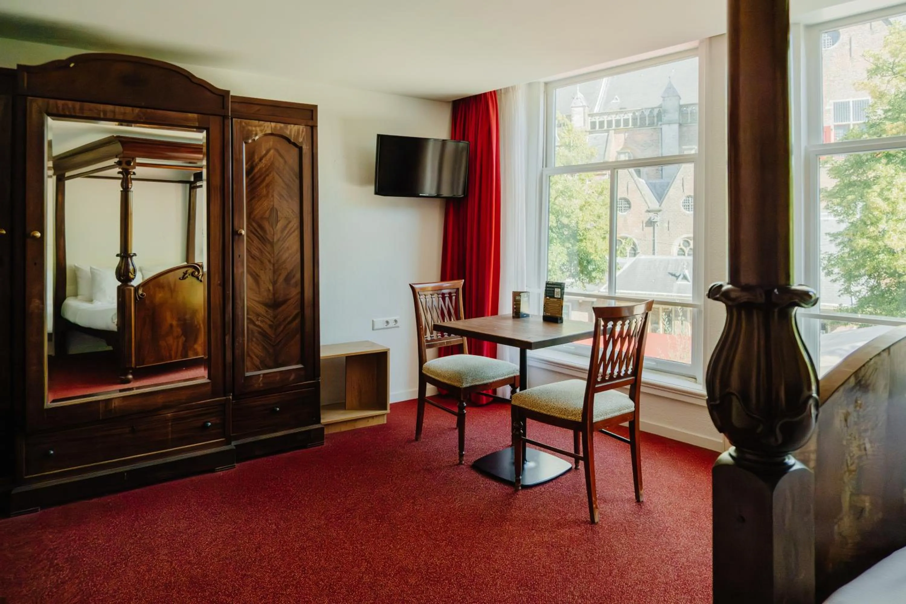 Bed in Ambassador City Centre Hotel