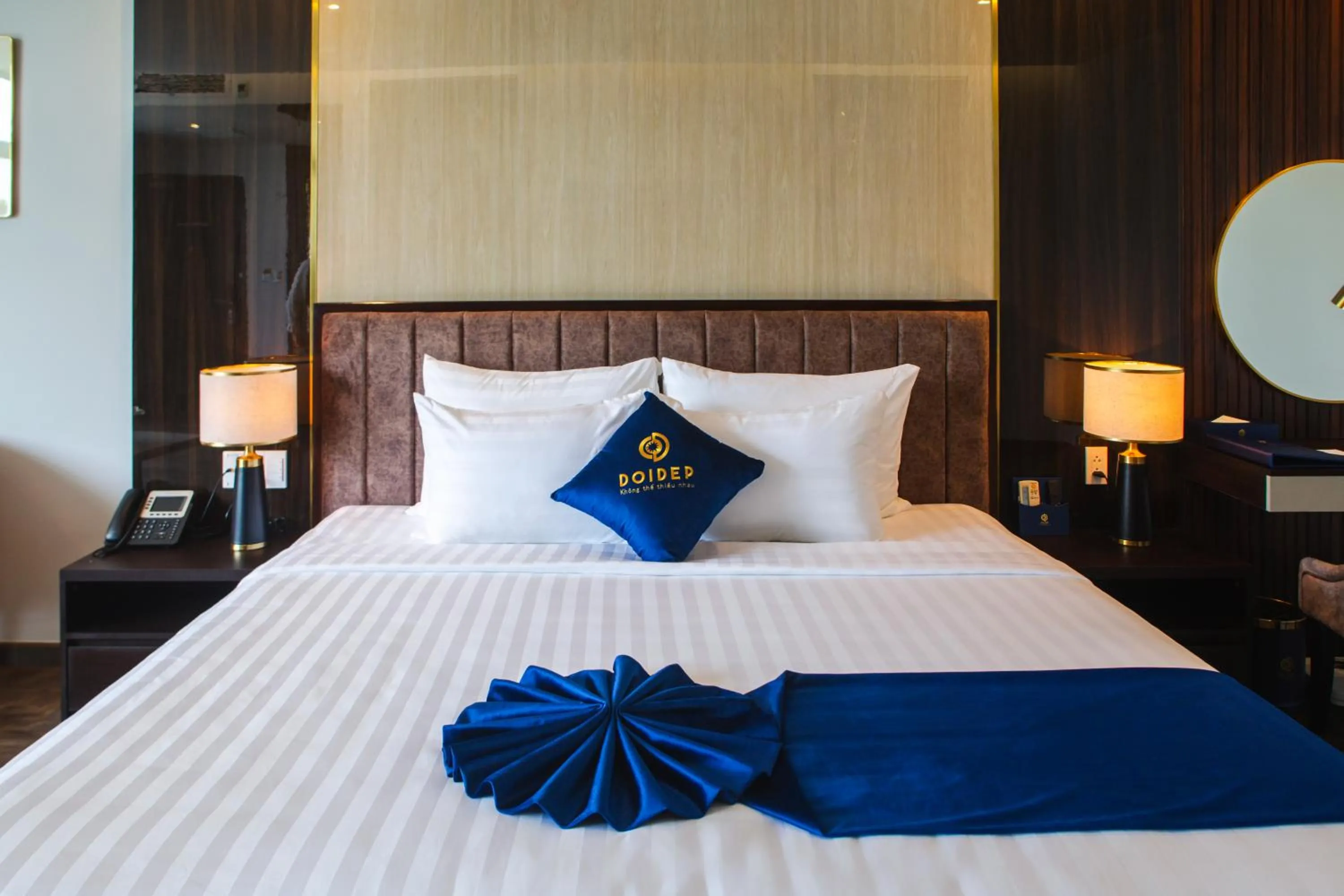 Bed in SANDALS AQUILA HOTEL