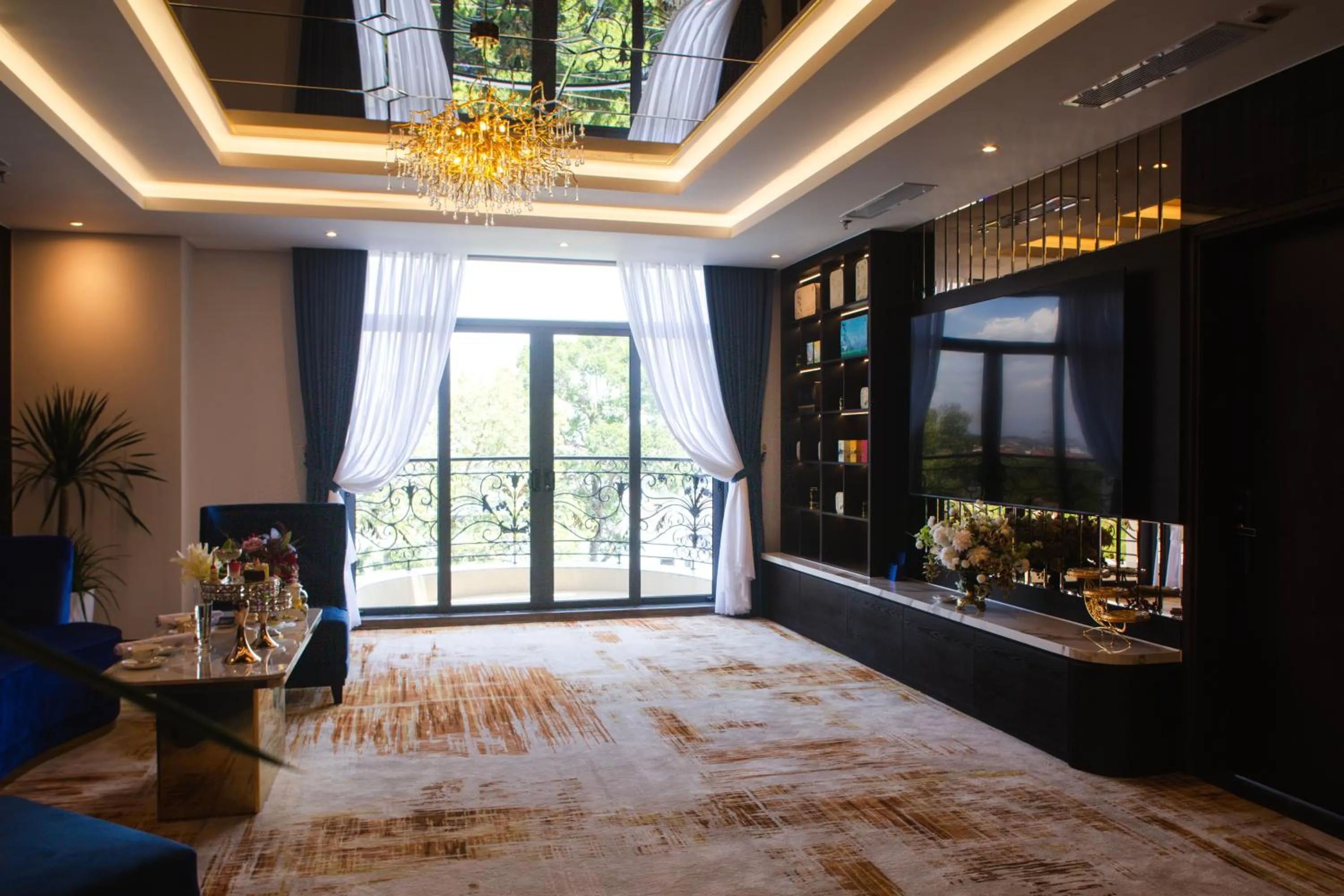 Living room, Bed in SANDALS AQUILA HOTEL