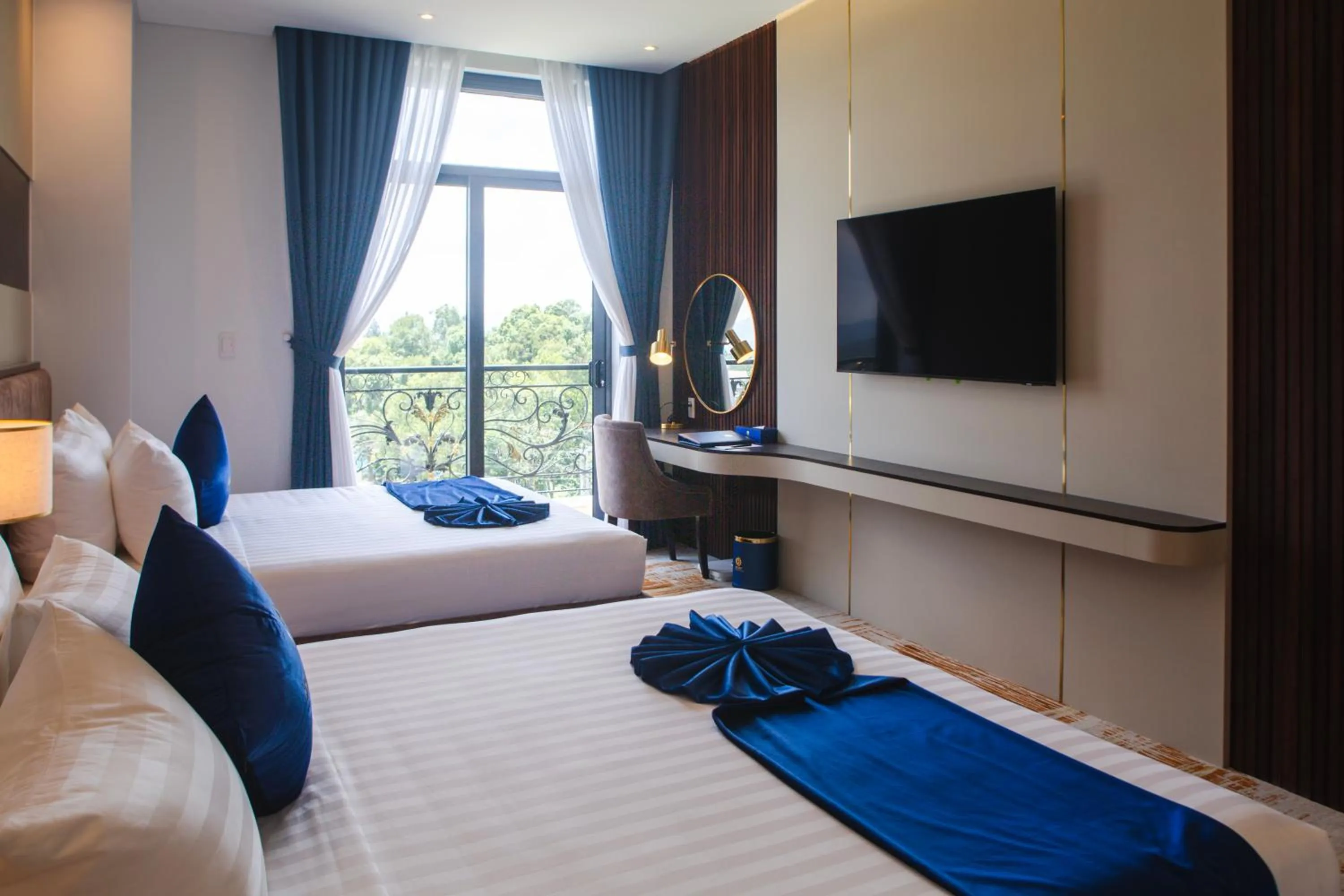 Bed in SANDALS AQUILA HOTEL