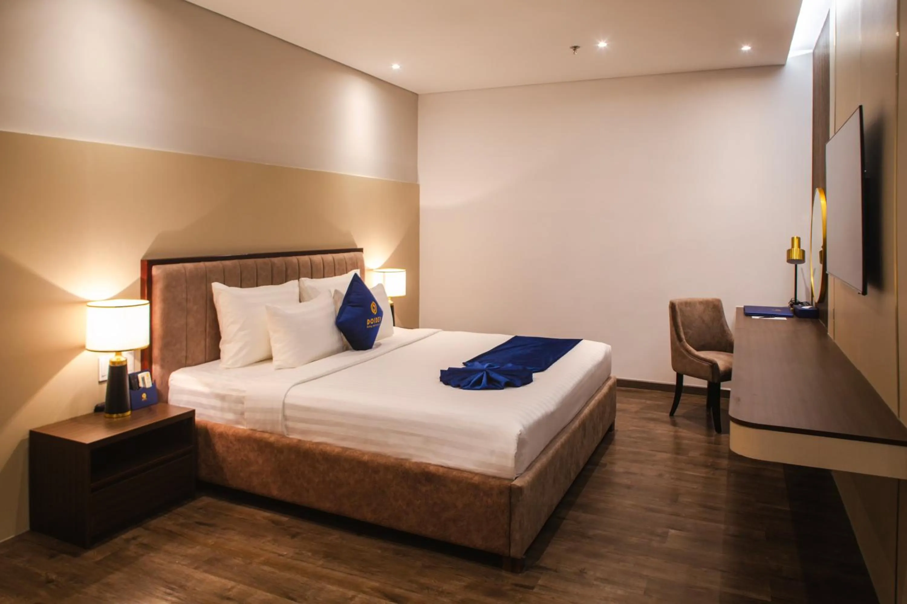 Bed in SANDALS AQUILA HOTEL