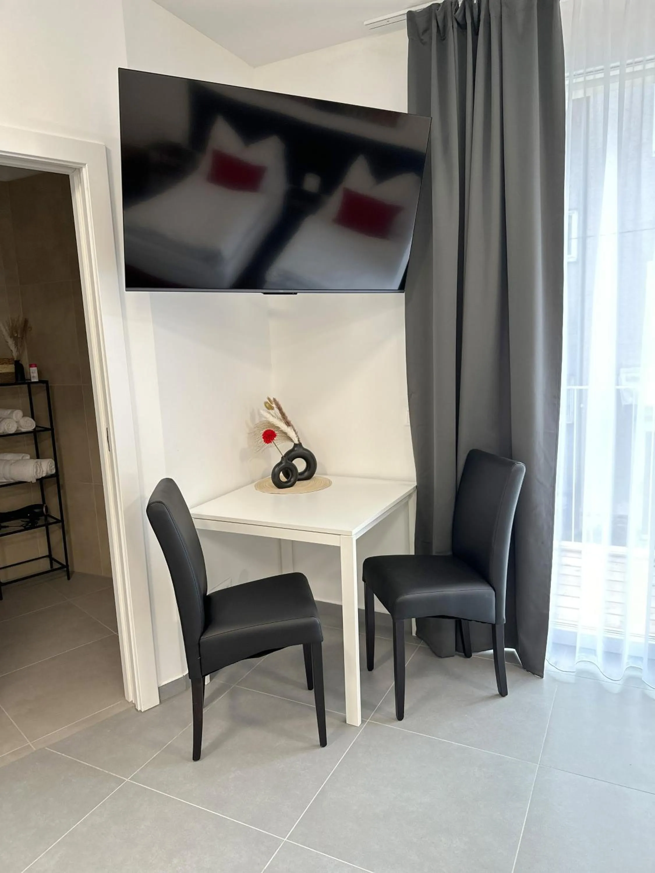 TV and multimedia in Grazora Living Apartments