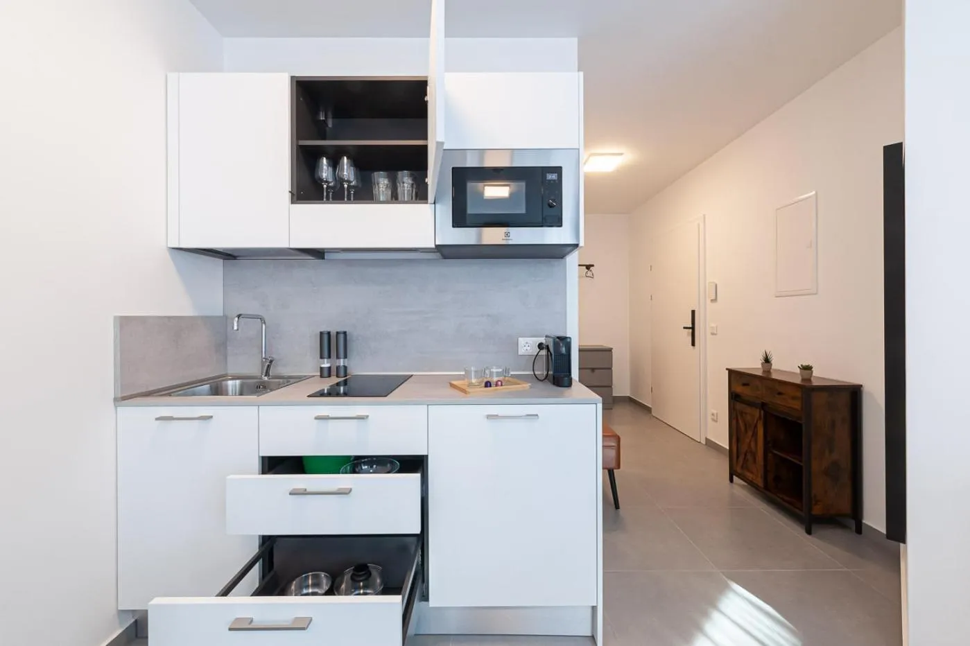 Kitchen or kitchenette in Grazora Living Apartments