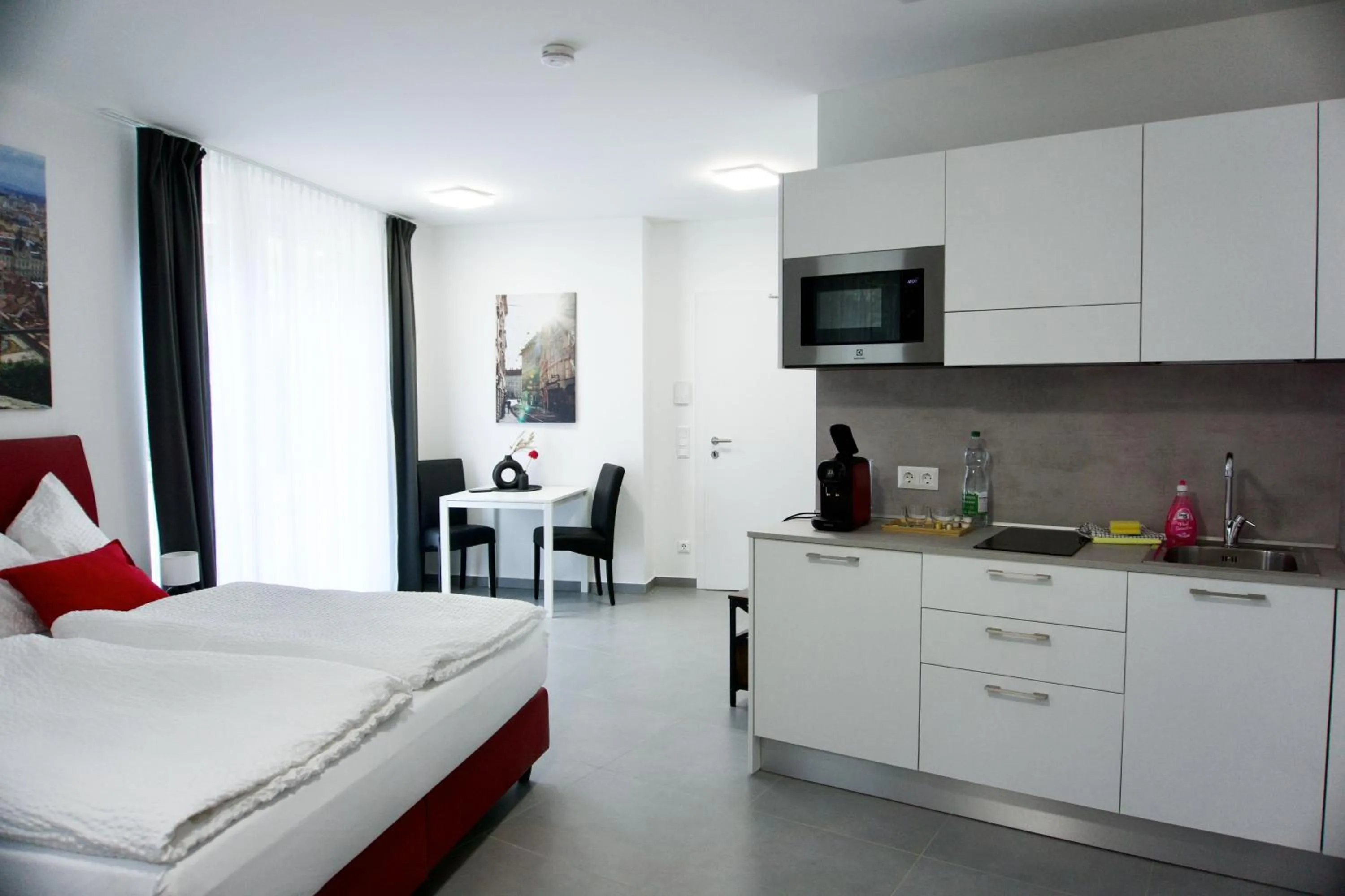 Kitchen or kitchenette, Bed in Grazora Living Apartments