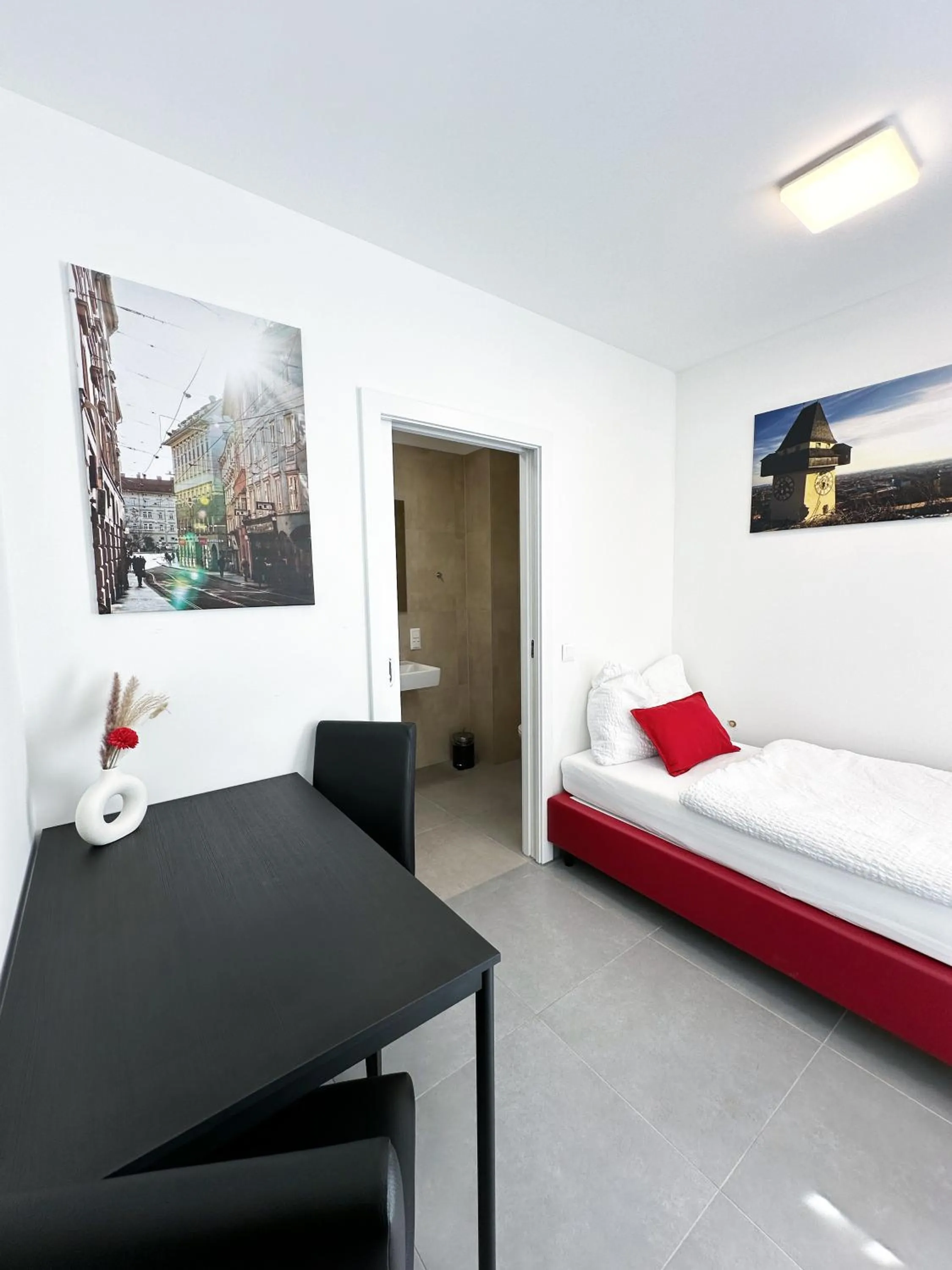 Living room, Bed in Grazora Living Apartments