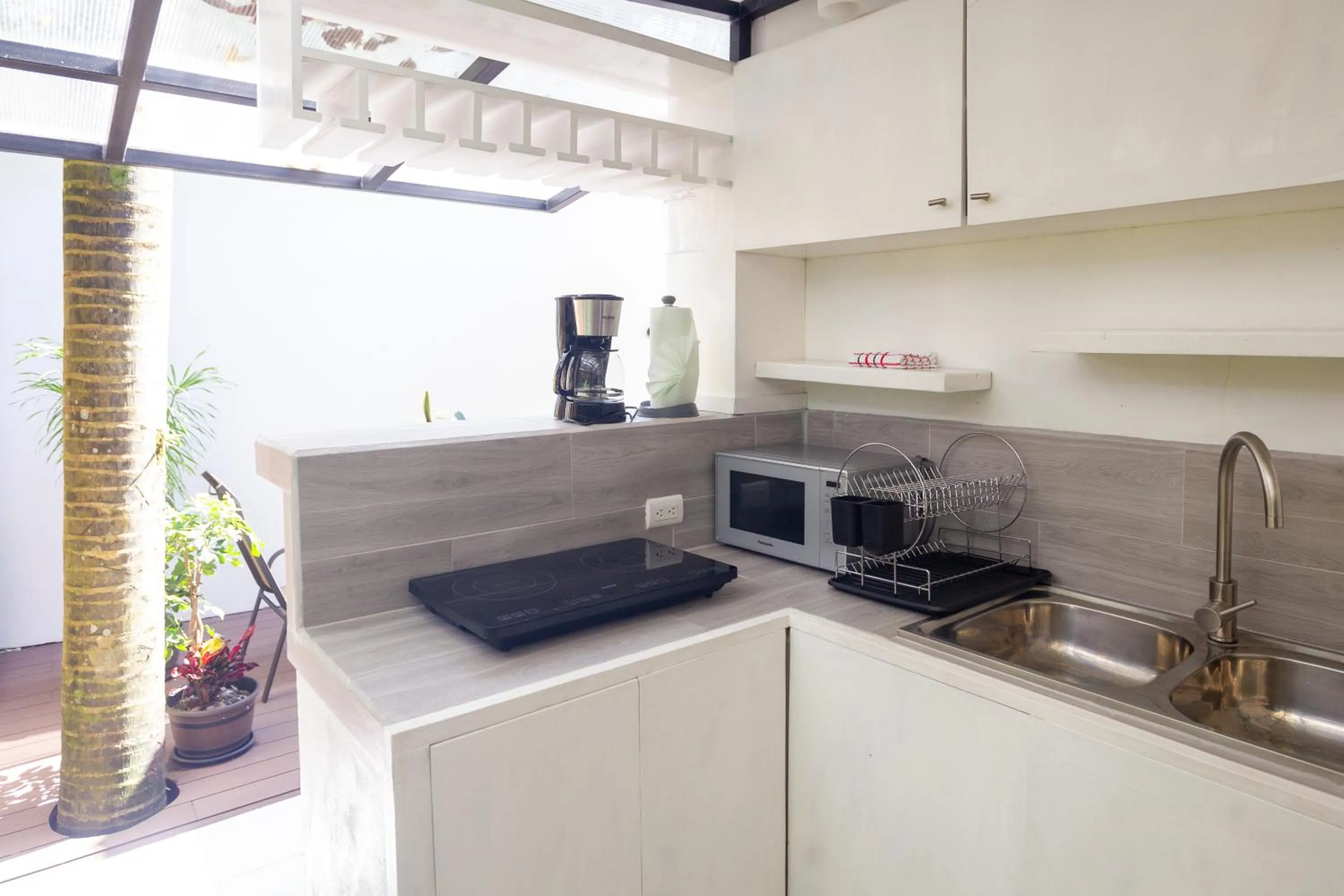 Kitchen or kitchenette in La Vela Boutique Hotel