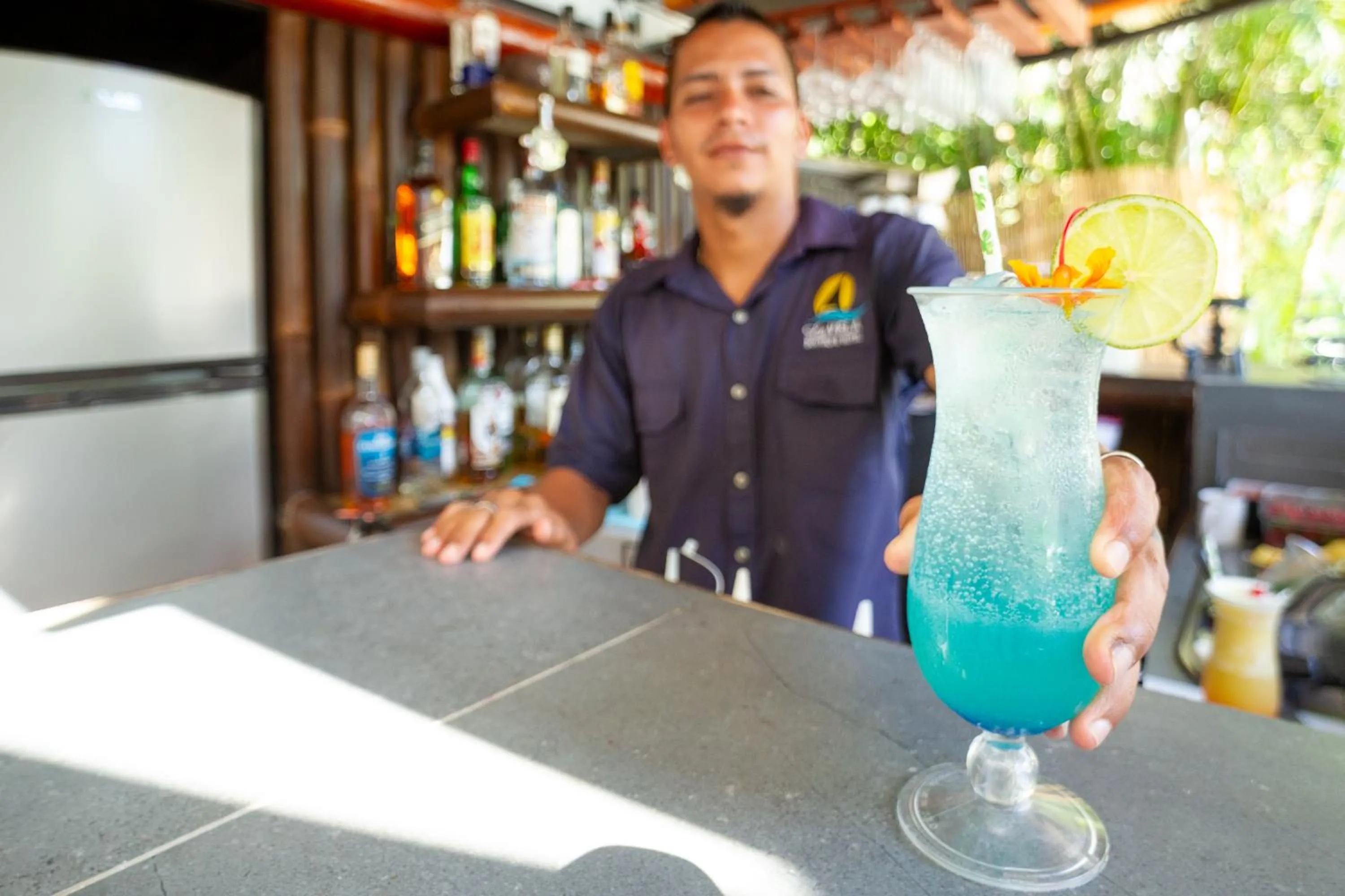 Lounge or bar in La Vela Boutique Hotel