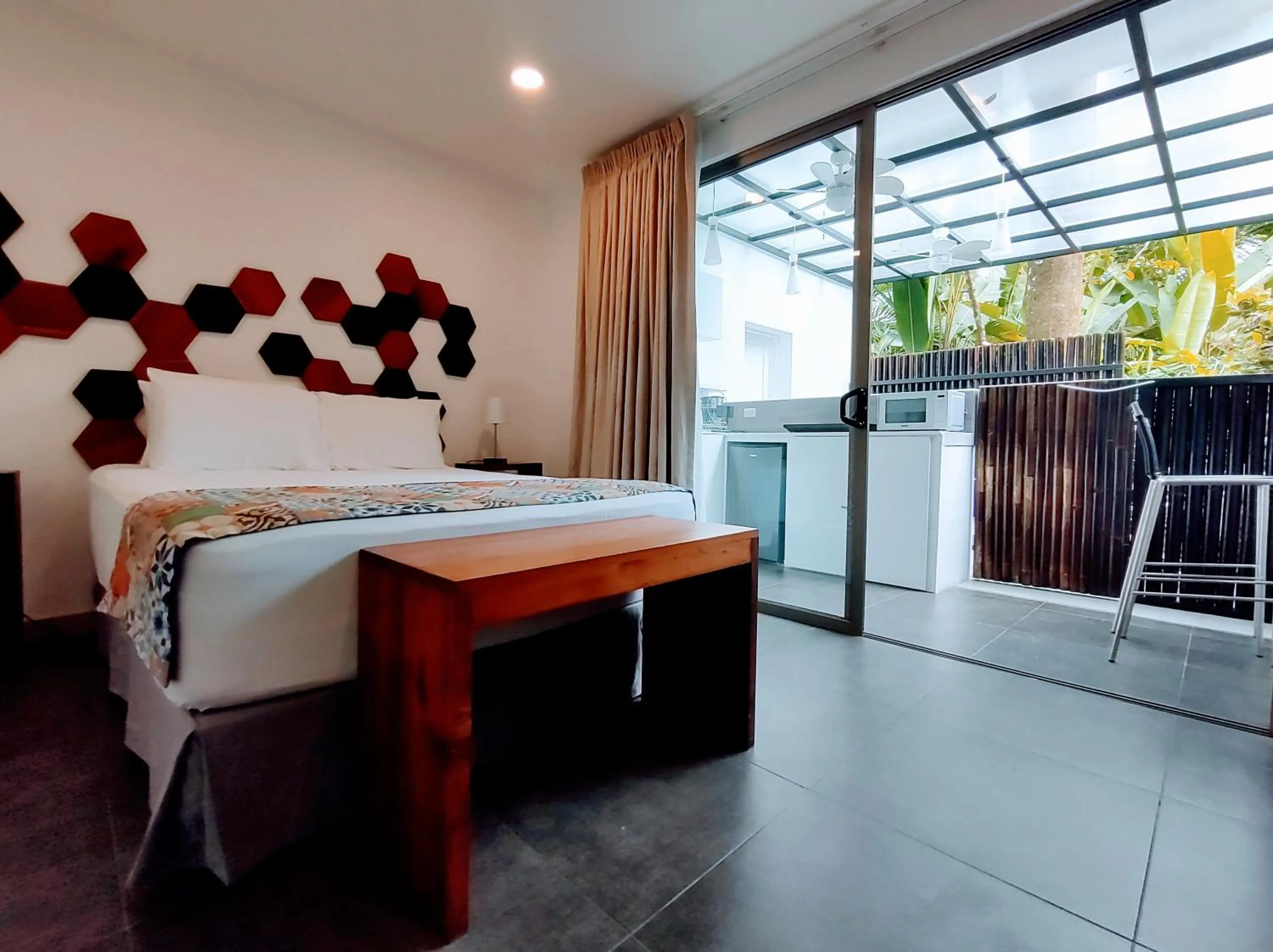 Bed in La Vela Boutique Hotel