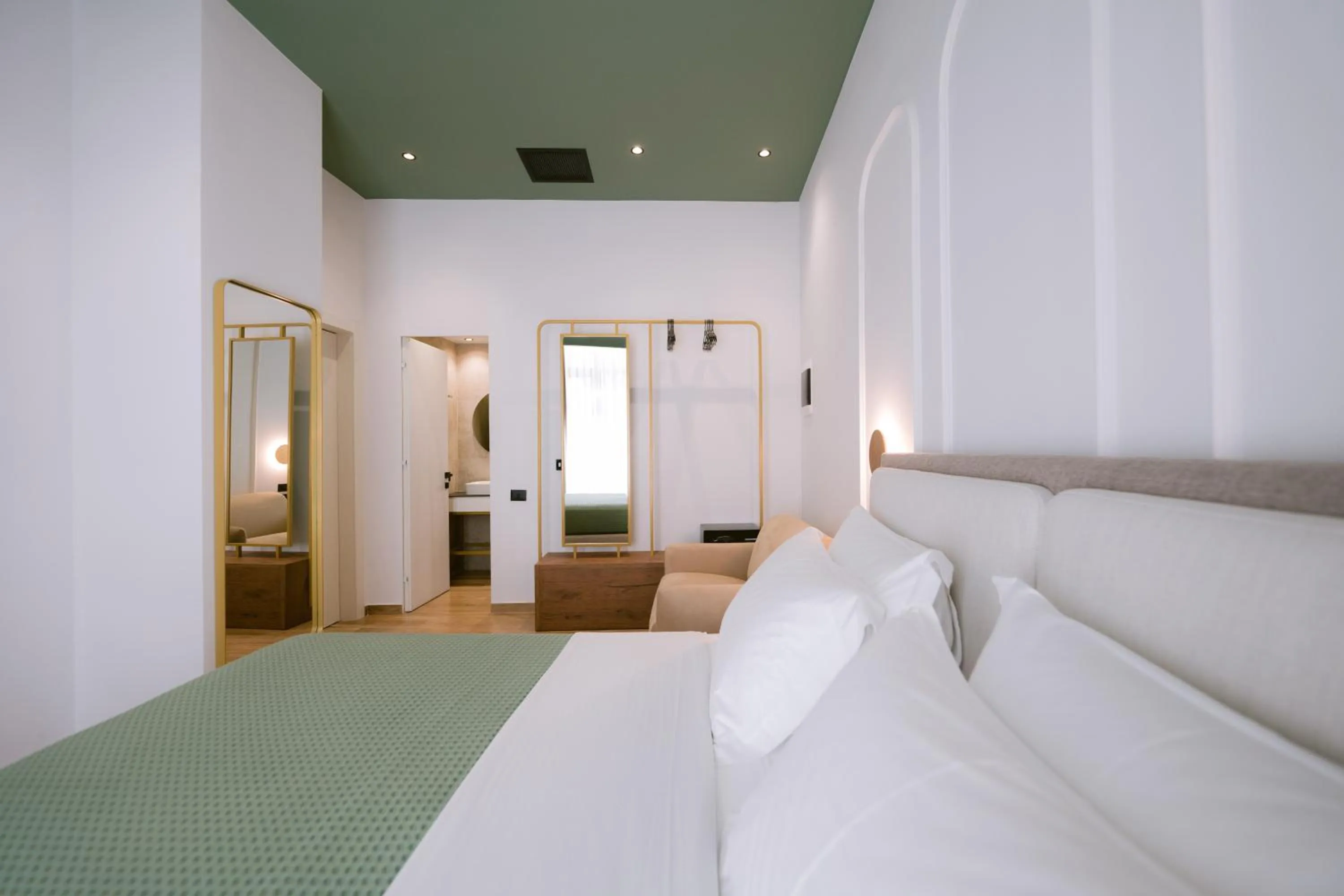 Living room, Bed in Noemie Hotel