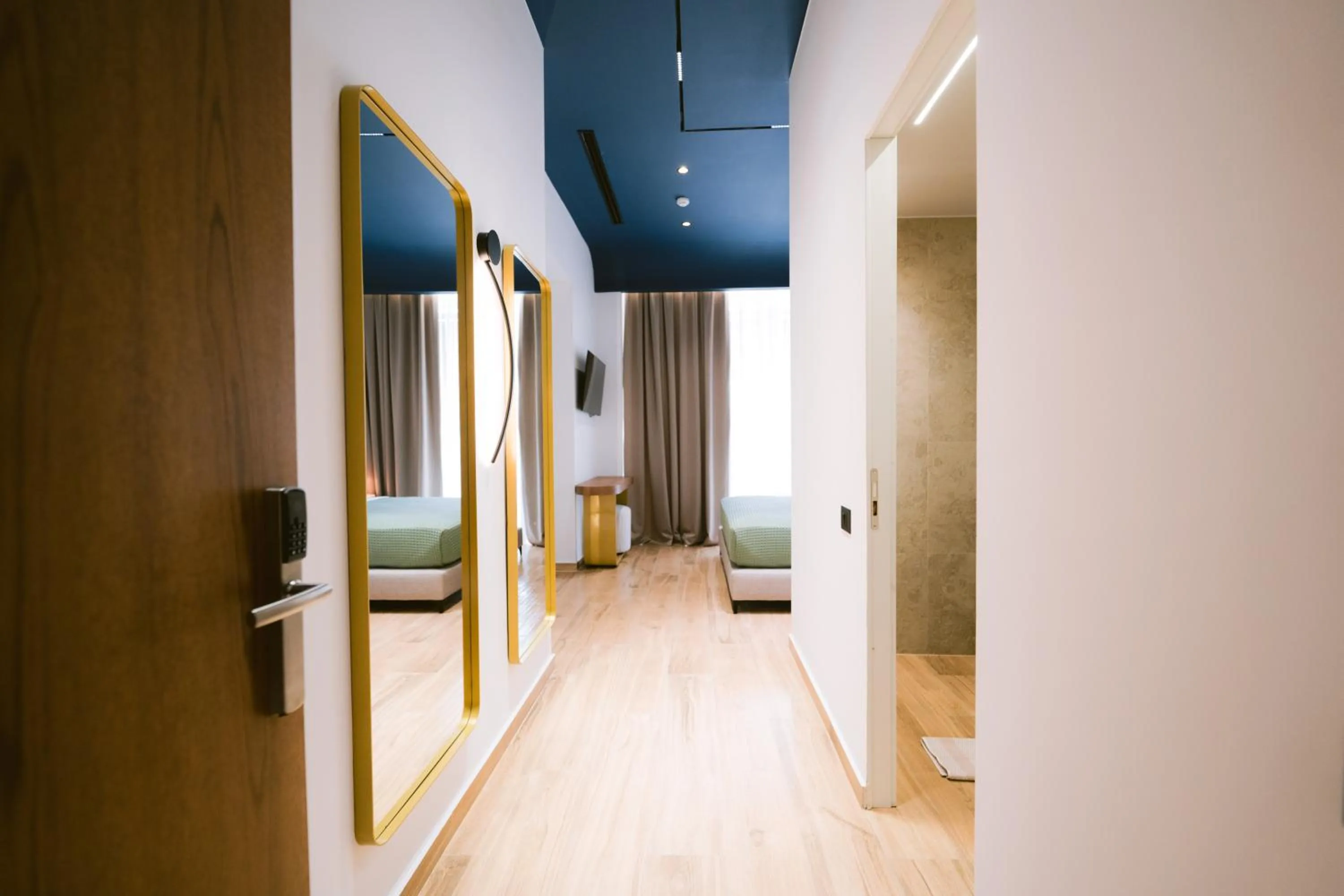 Living room, Bed in Noemie Hotel