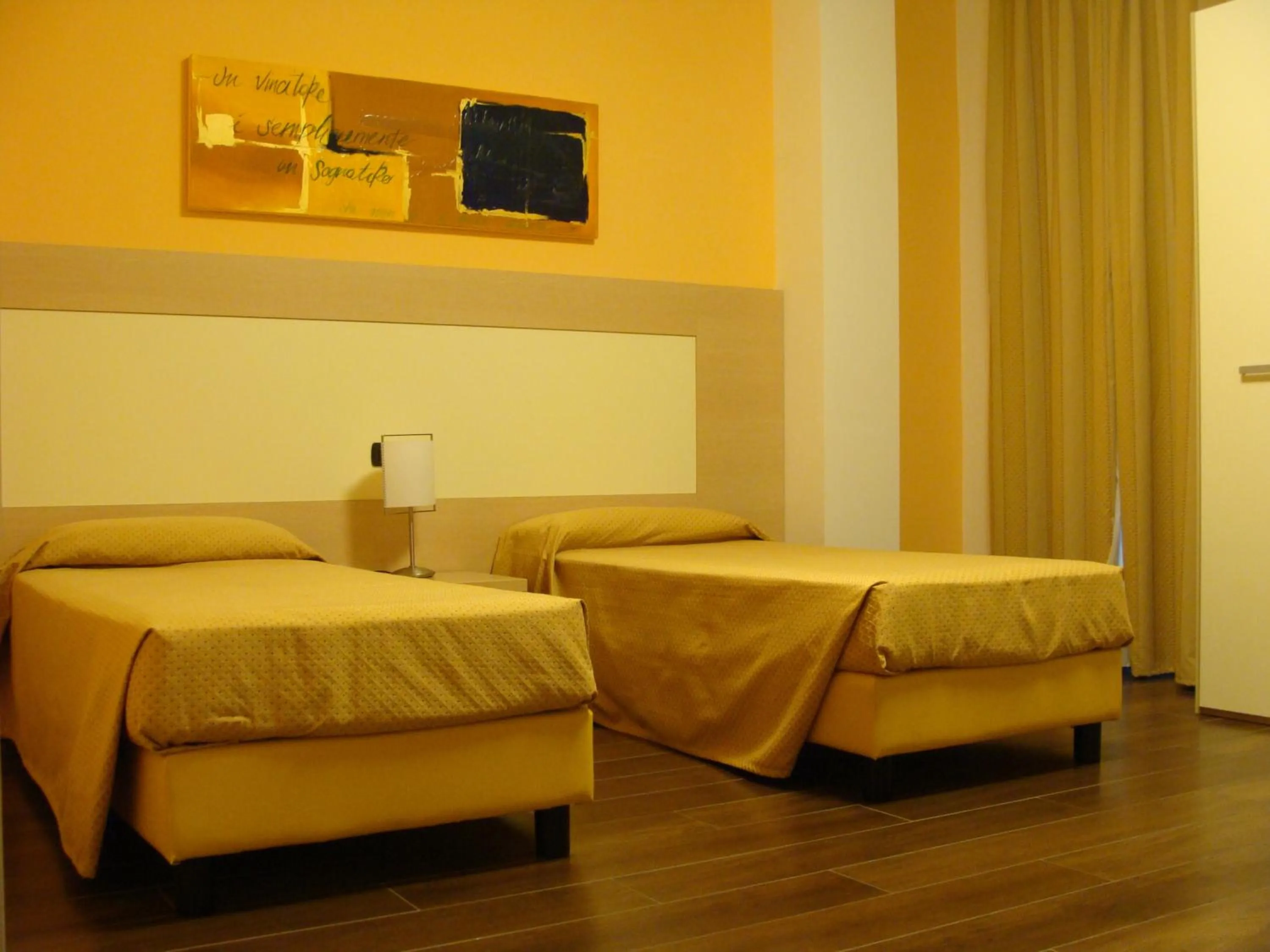 Bed in Groane Hotel Residence